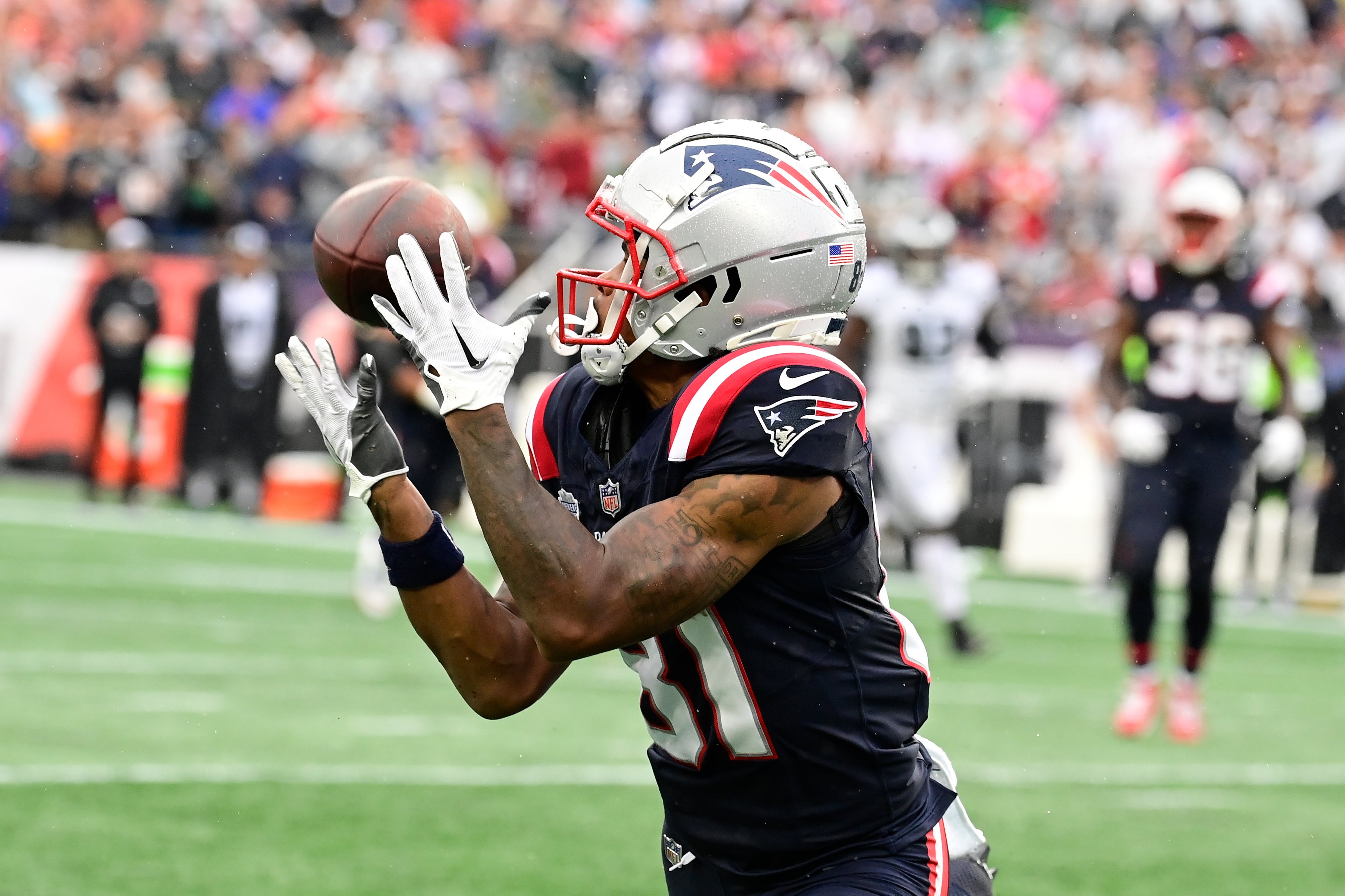 Sep 10, 2023; Foxborough, Massachusetts, USA; New England Patriots wide receiver Demario Douglas (81) makes a catch during the first half against the Philadelphia Eagles at Gillette Stadium.