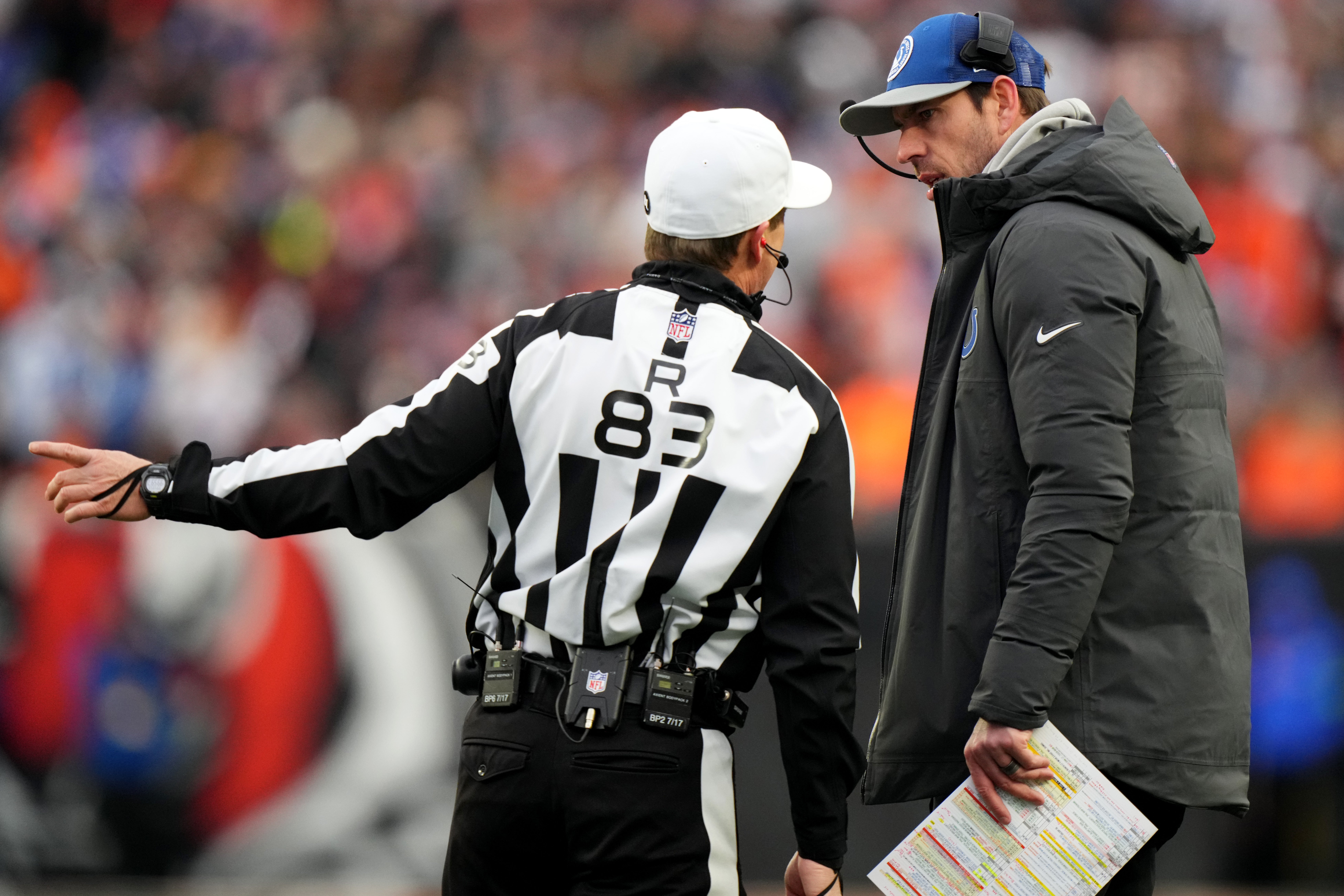 Dec. 10, 2023; Cincinnati, Ohio, USA; Referee Shawn Hochuli (83) talks with Indianapolis Colts head coach Shane Steichen in the third quarter during game between the Indianapolis Colts and the Cincinnati Bengals Paycor Stadium.