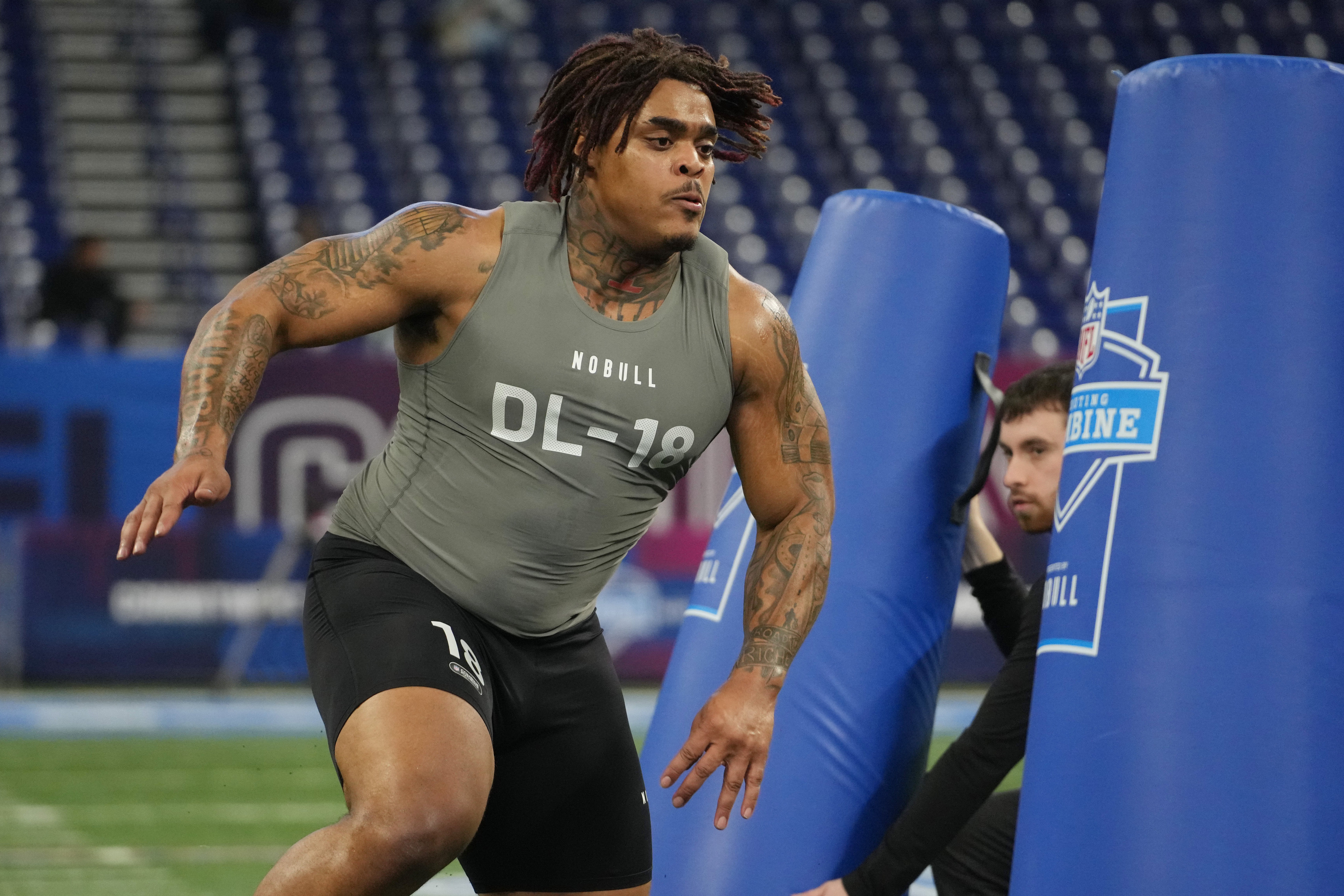 Feb 29, 2024; Indianapolis, IN, USA; Texas defensive lineman Byron Murphy (DL18) works out during the 2024 NFL Combine at Lucas Oil Stadium.