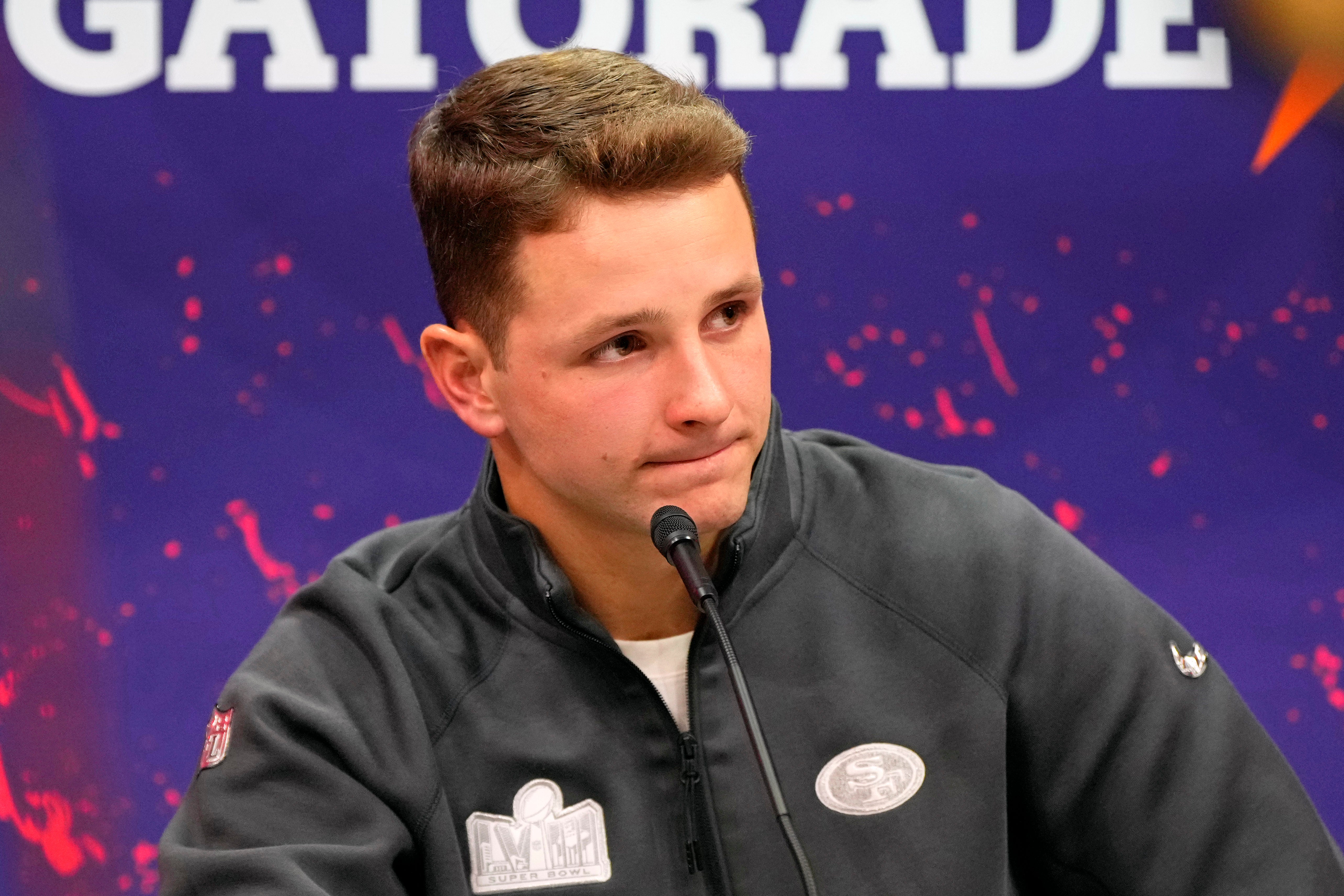 Feb 5, 2024; Las Vegas, NV, USA; San Francisco 49ers quarterback Brock Purdy (13) talks to the media during Super Bowl LVIII Opening Night at Allegiant Stadium.