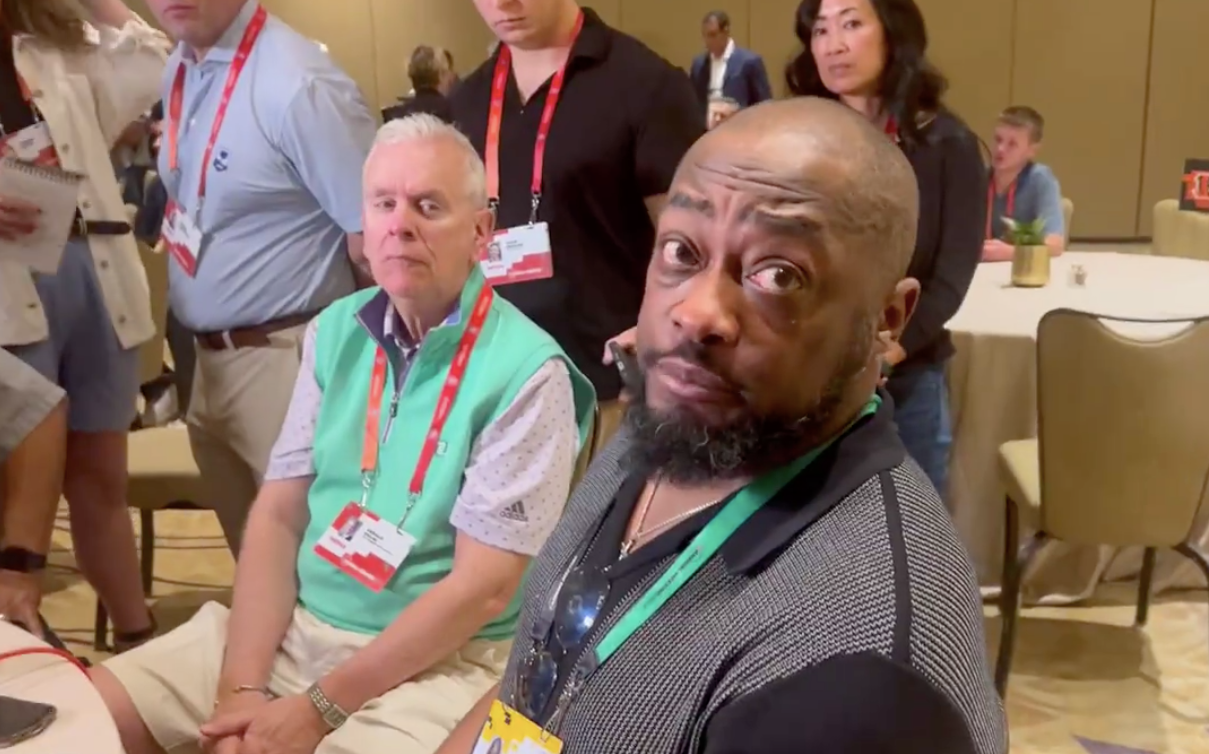Steelers head coach Mike Tomlin speaks to 94WIP's Eliot Shorr-Parks at the NFL league meetings in Orlando, Florida.