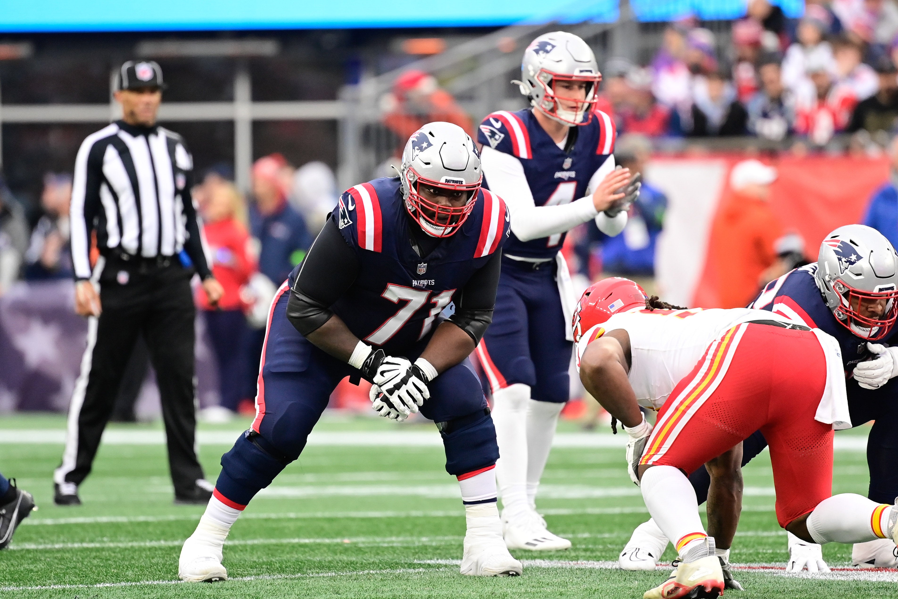 Dec 17, 2023; Foxborough, Massachusetts, USA; New England Patriots guard Mike Onwenu (71) lines up against the Kansas City Chiefs during the second half at Gillette Stadium.