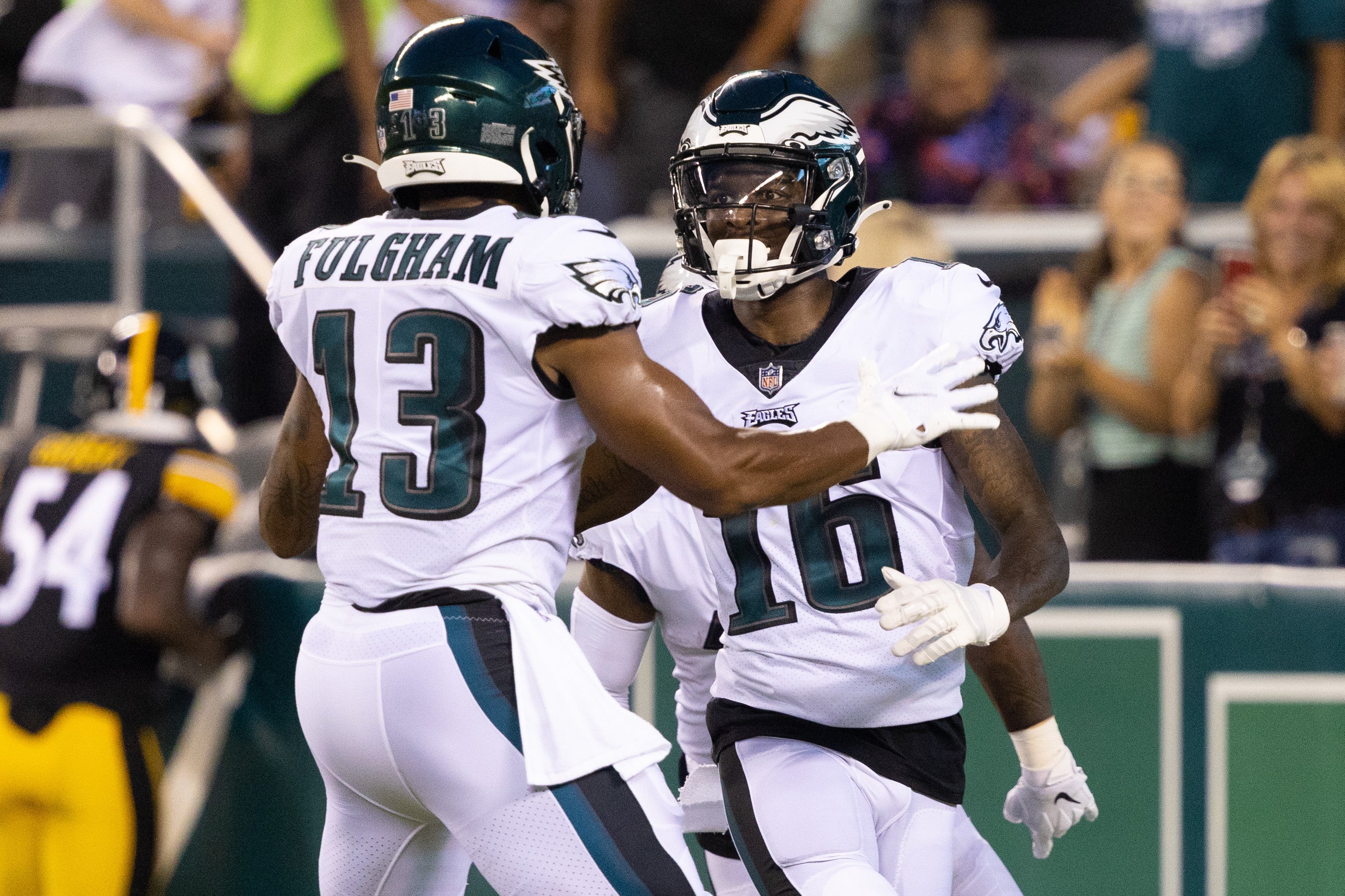 Aug 12, 2021; Philadelphia, Pennsylvania, USA; Philadelphia Eagles wide receiver Quez Watkins (16) celebrates with wide receiver Travis Fulgham (13) after scoring a touchdown against the Pittsburgh Steelers during the first quarter at Lincoln Financial Field. Mandatory Credit: Bill Streicher-USA TODAY Sports