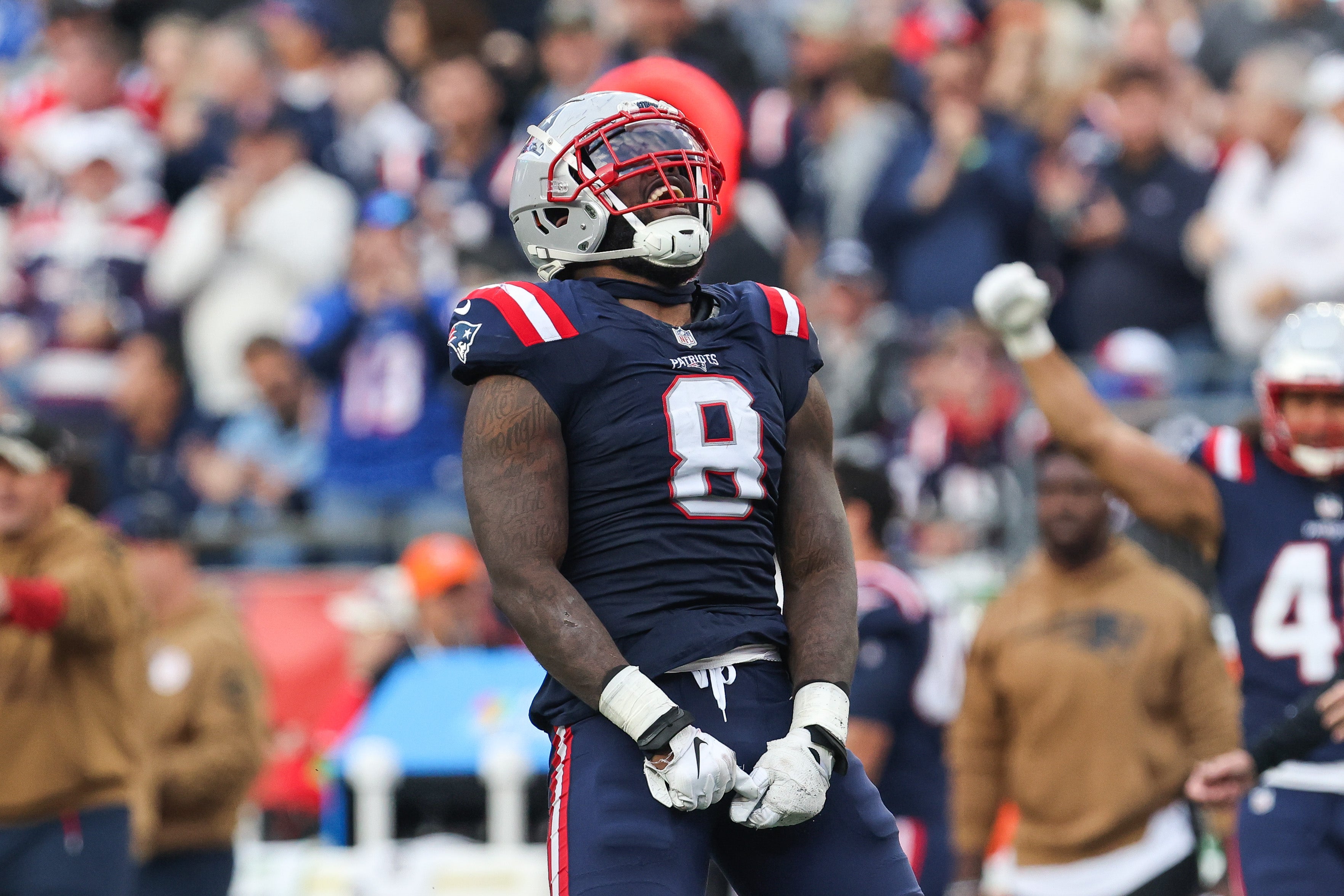 Nov 5, 2023; Foxborough, Massachusetts, USA; New England Patriots linebacker Ja'Whaun Bentley (8) celebrates after sacking Washington Commanders quarterback Sam Howell (14) during the second half at Gillette Stadium.