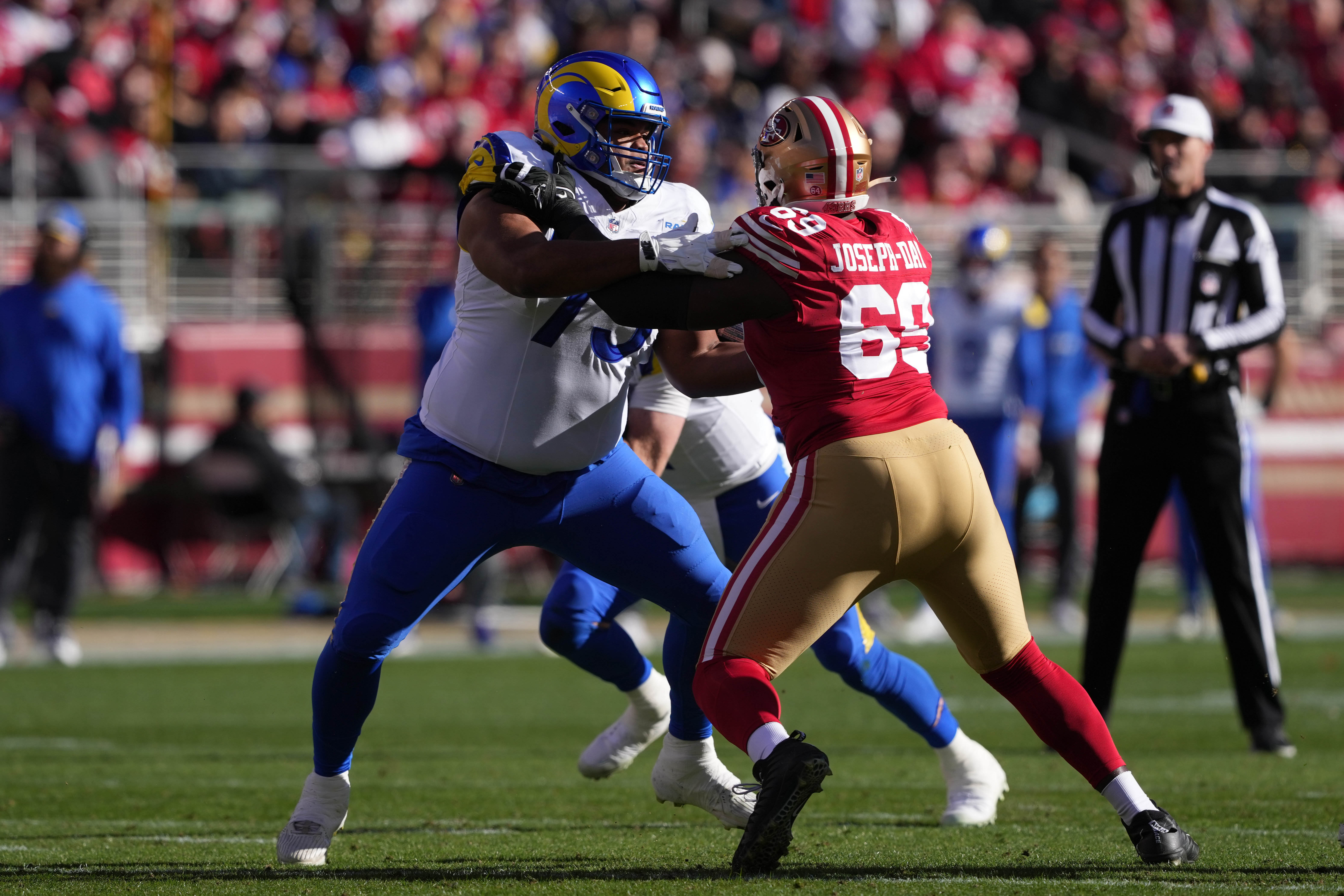 Jan 7, 2024; Santa Clara, California, USA; Los Angeles Rams offensive tackle Rob Havenstein (left) blocks San Francisco 49ers defensive tackle Sebastian Joseph-Day (69) during the first quarter at Levi's Stadium.