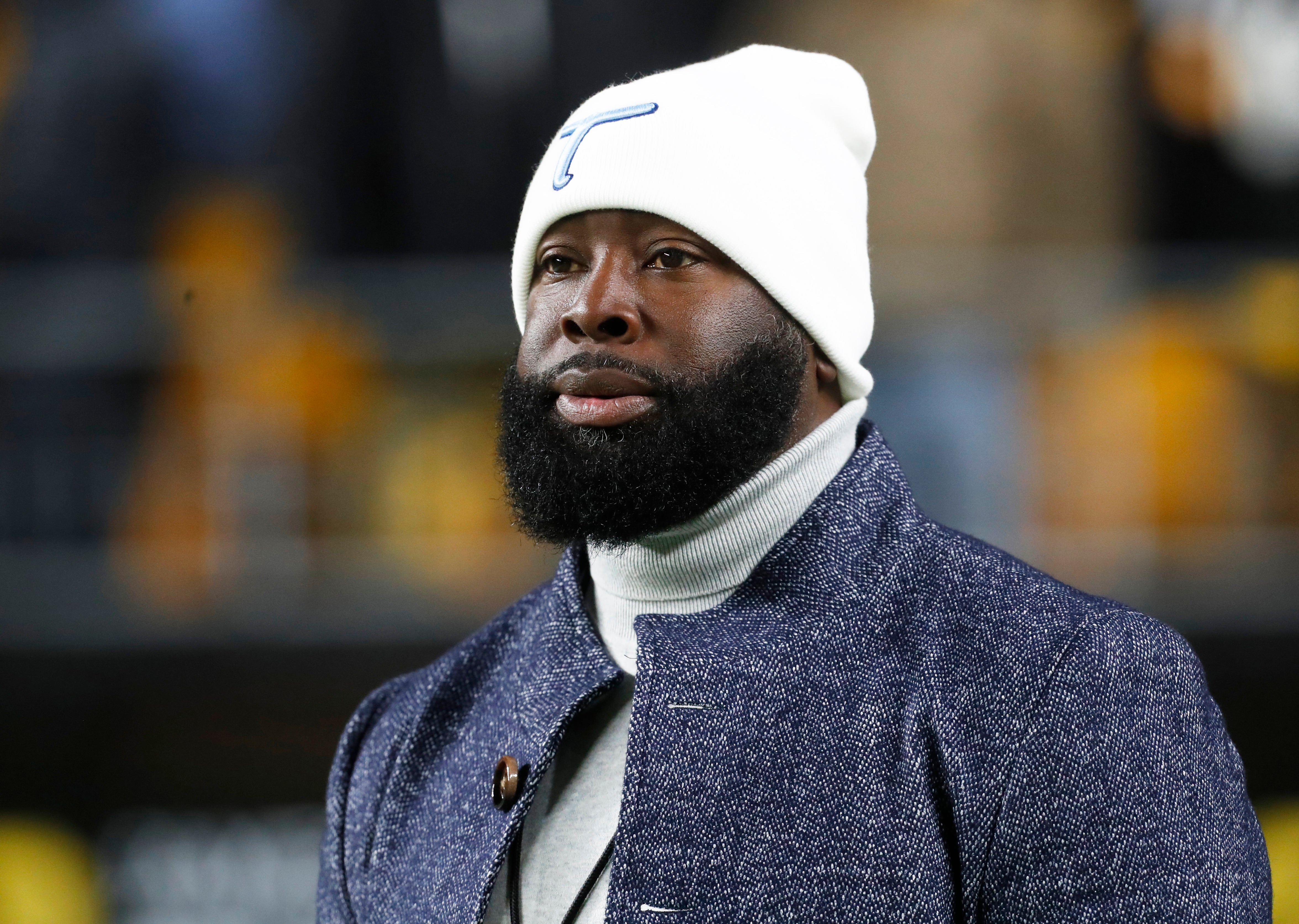Nov 2, 2023; Pittsburgh, Pennsylvania, USA; Tennessee Titans general manager Ran Carthon watches game action from the sidelines against the Pittsburgh Steelers during the fourth quarter at Acrisure Stadium. Pittsburgh won 20-16. Mandatory Credit: Charles LeClaire-USA TODAY Sports
