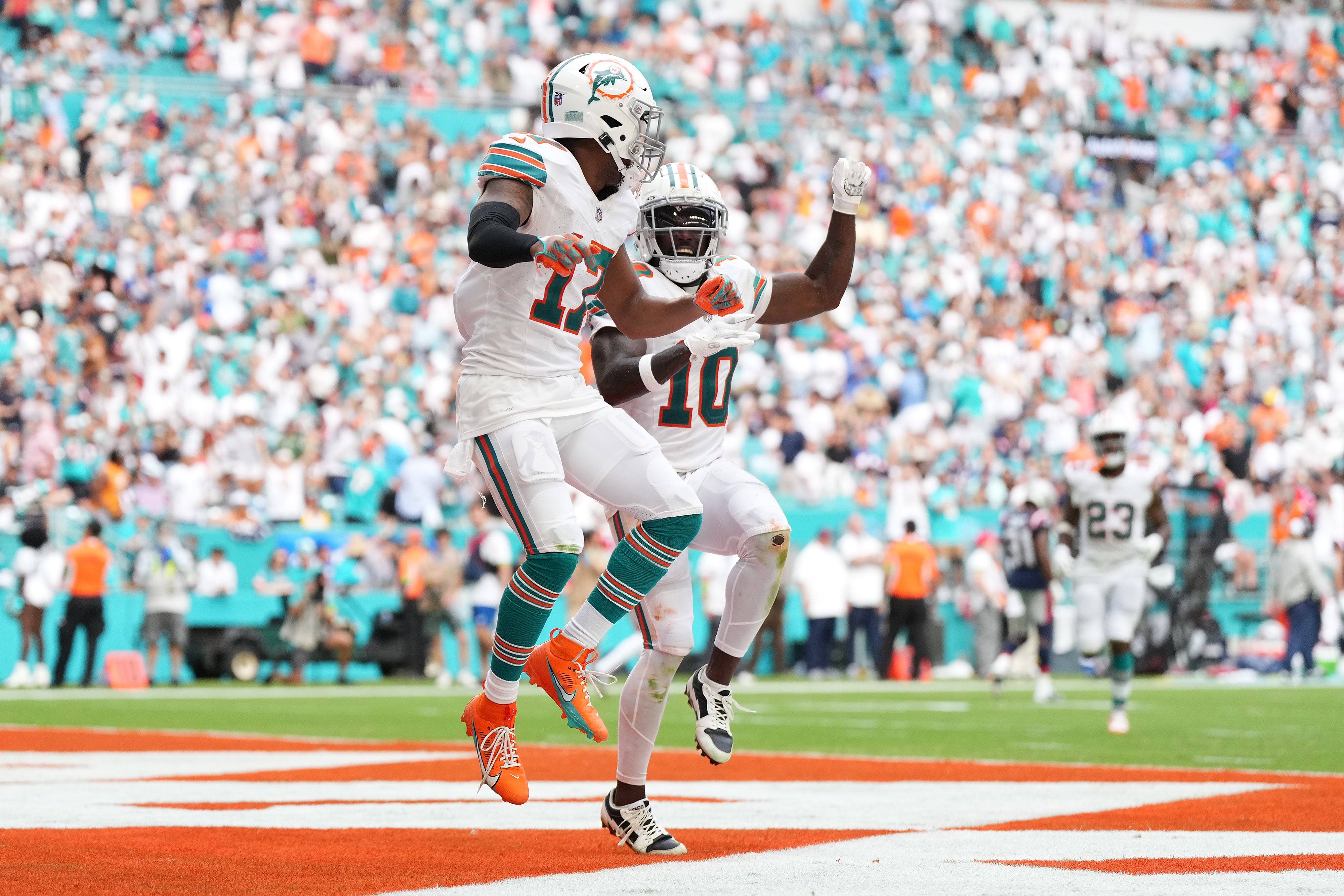 Oct 29, 2023; Miami Gardens, Florida, USA; Miami Dolphins wide receiver Jaylen Waddle (17) celebrates his touchdown against the New England Patriots with wide receiver Tyreek Hill (10) during the second half at Hard Rock Stadium.
