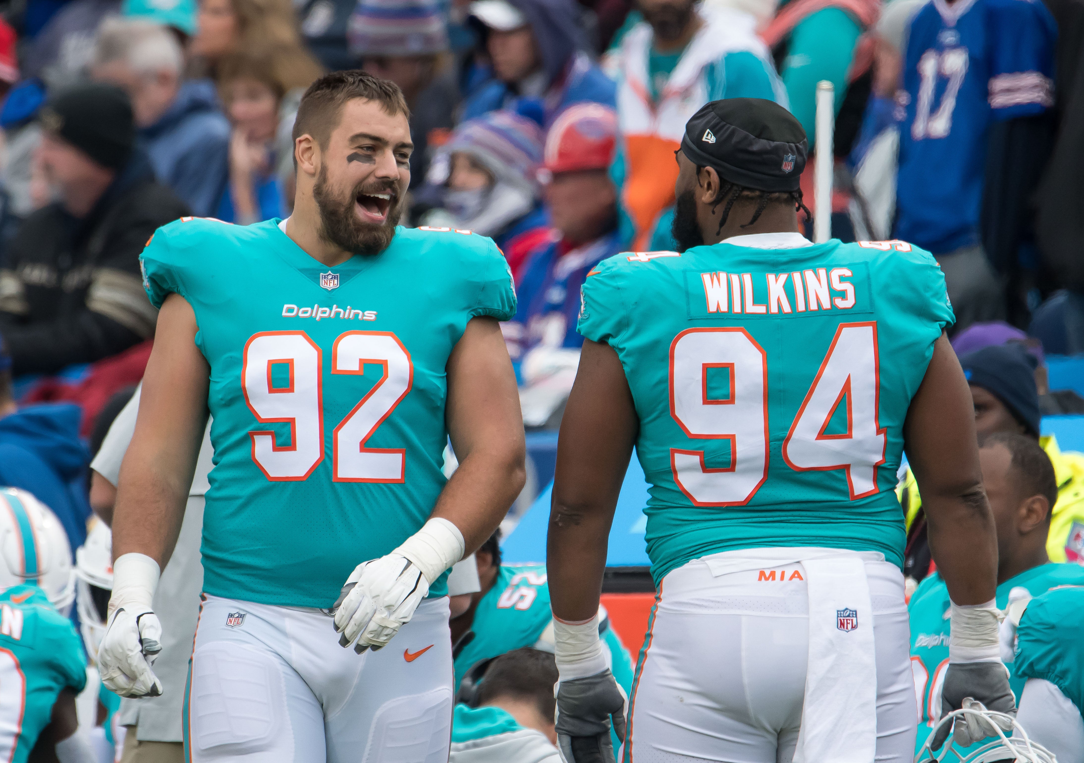 Oct 31, 2021; Orchard Park, New York, USA; Miami Dolphins defensive end Zach Sieler (92) has a discussion with defensive end Christian Wilkins (94) in the third quarter of a game against the Buffalo Bills at Highmark Stadium.