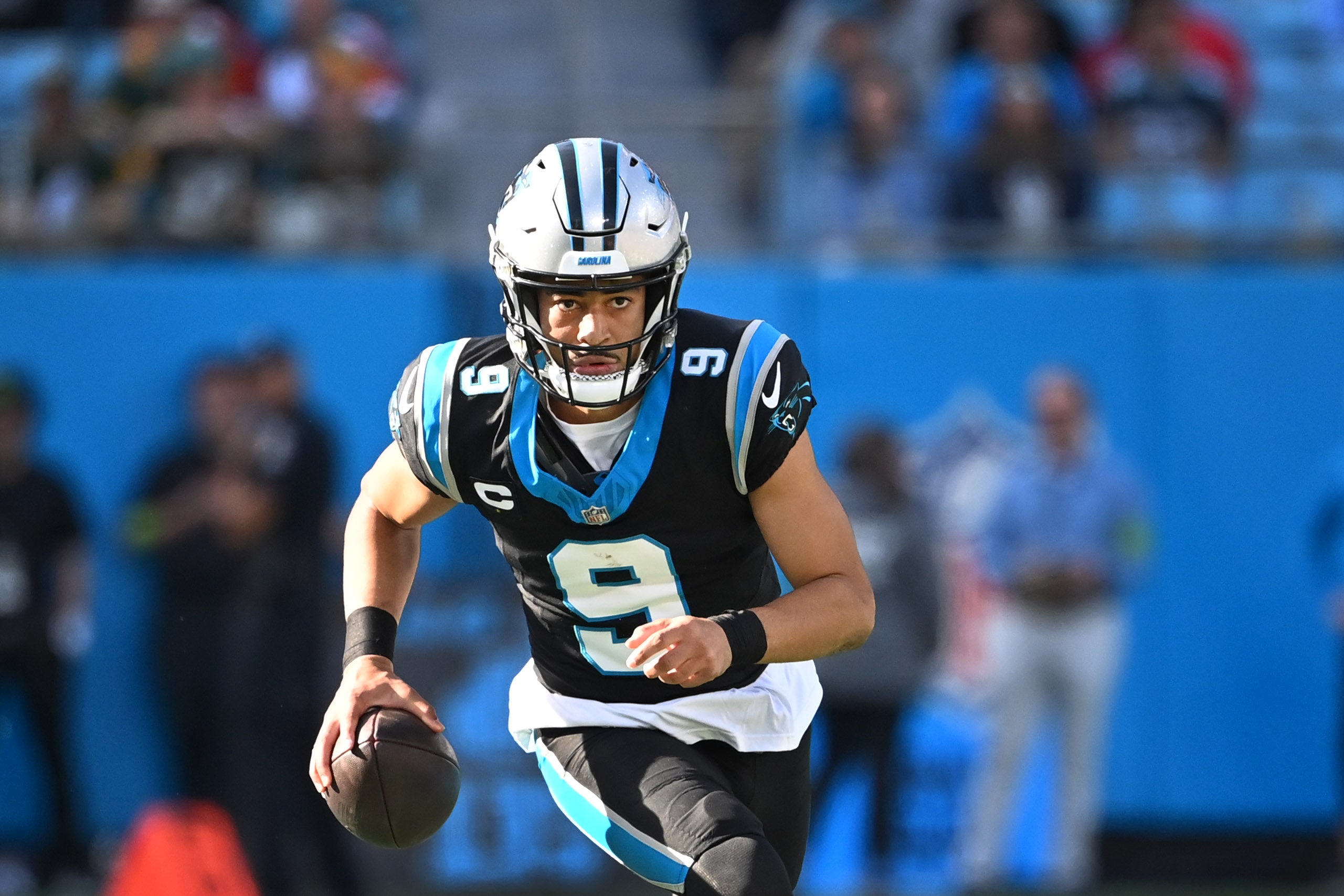 Dec 24, 2023; Charlotte, North Carolina, USA; Carolina Panthers quarterback Bryce Young (9) with the ball in the second quarter at Bank of America Stadium. Mandatory Credit: Bob Donnan-USA TODAY Sports