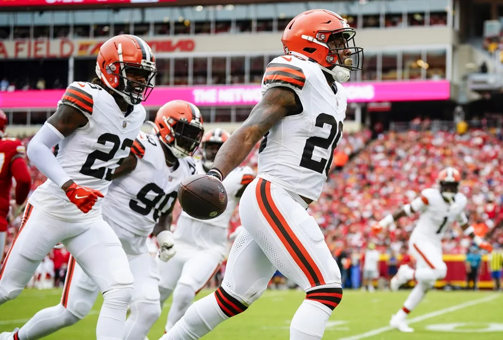 Cleveland Browns safety Rodney McLeod (26) celebrates with teammates after an interception against the Kansas City Chiefs during the first half at GEHA Field at Arrowhead Stadium.