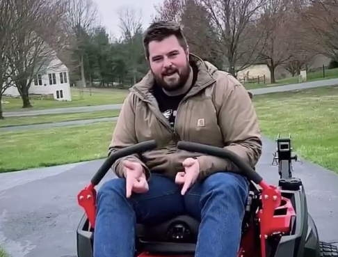 Philadelphia Eagles left guard Landon Dickerson shows off his new Gravely lawnmower.