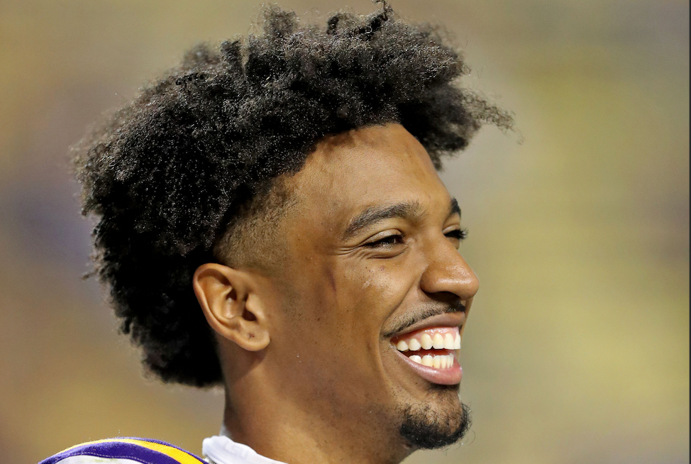 Oct 21, 2023; Baton Rouge, Louisiana, USA; LSU Tigers quarterback Jayden Daniels (5) smiles during the second half against the Army Black Knights at Tiger Stadium.