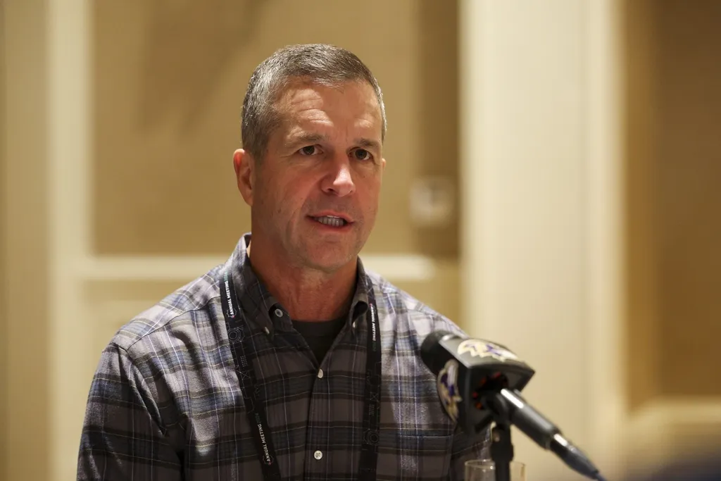 Baltimore Ravens head coach John Harbaugh talks to media during the NFL annual league meetings at the JW Marriott.