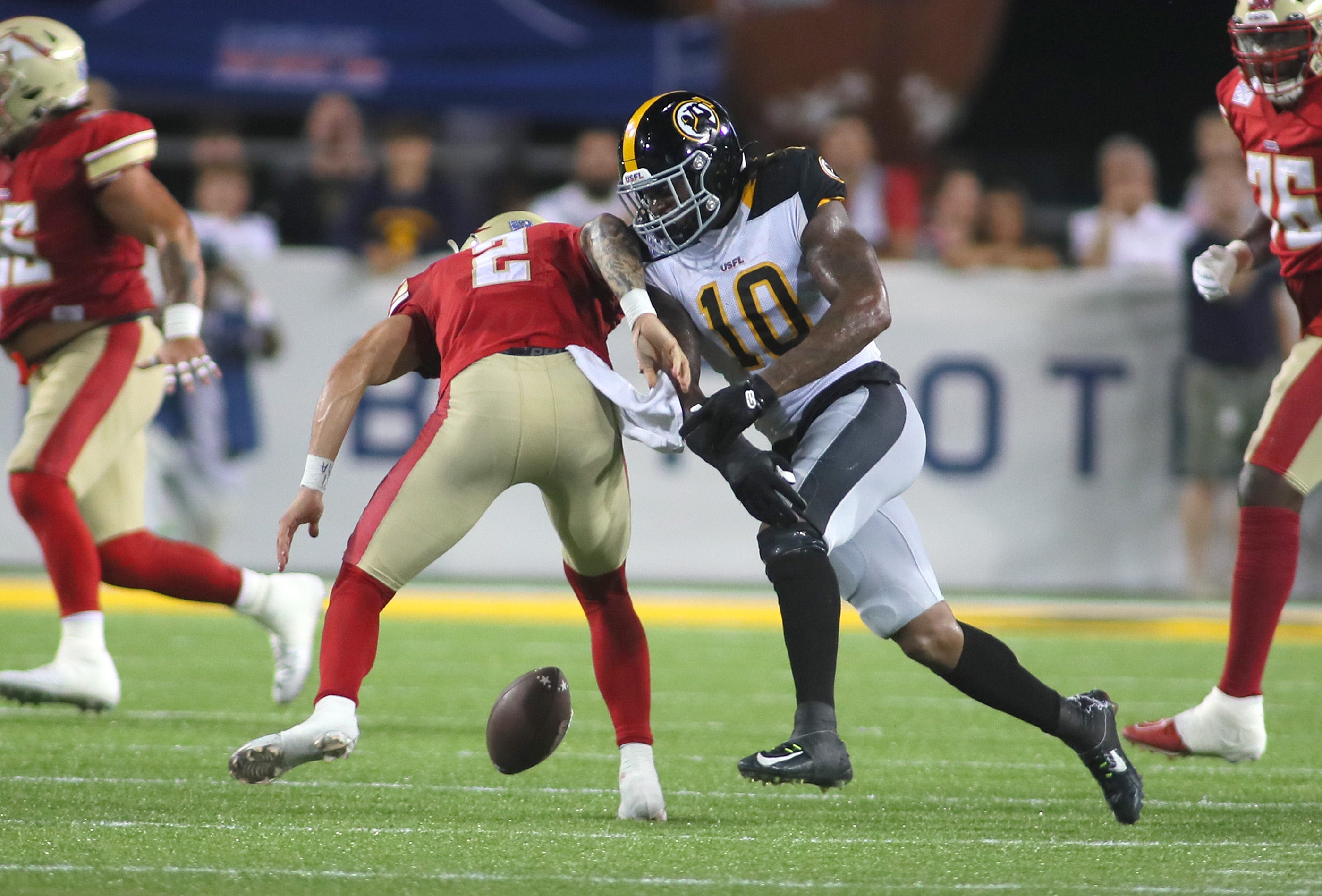 Pittsburgh Maulers Reuben Foster (10) forces a fumble on Birmingham Stallions Alex McGough (2) during the second half of the USFL Championship game Saturday evening at Tom Benson Stadium in Canton, OH.