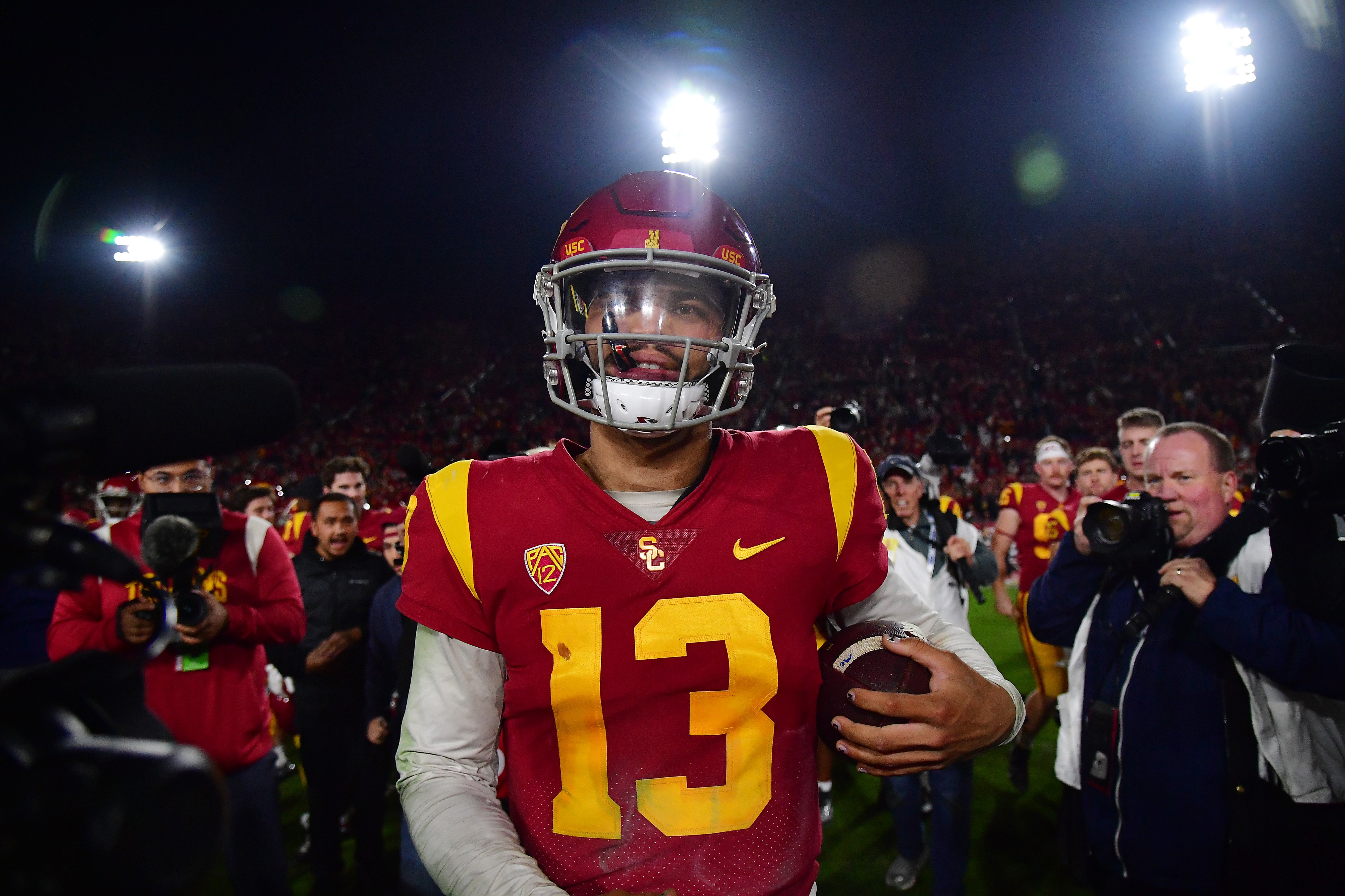 Nov 26, 2022; Los Angeles, California, USA; Southern California Trojans quarterback Caleb Williams (13) celebrates the victory against the Notre Dame Fighting Irish at the Los Angeles Memorial Coliseum.