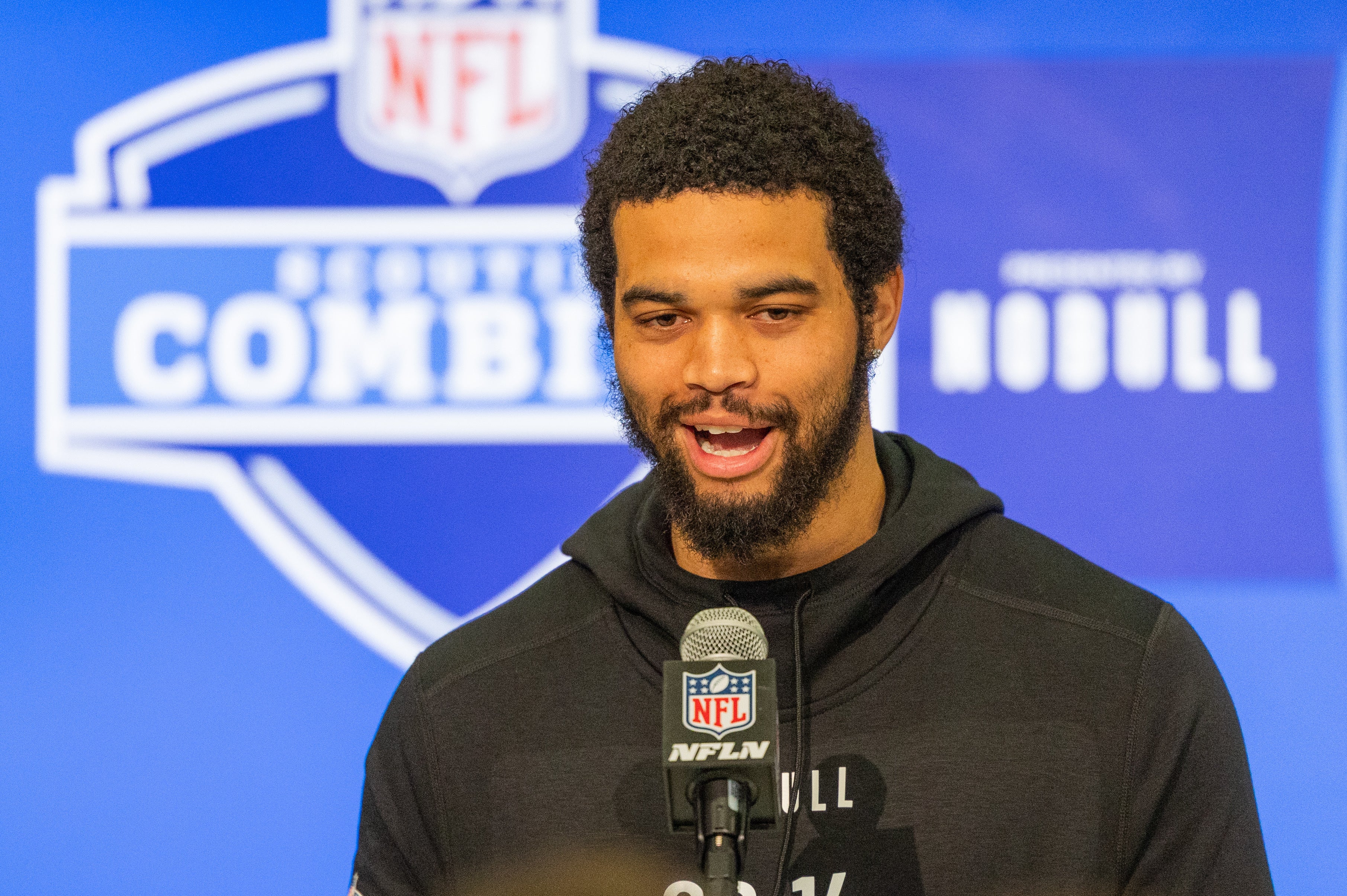 Mar 1, 2024; Indianapolis, IN, USA; Southern California quarterback Caleb Williams (QB14) talks to the media during the 2024 NFL Combine at Lucas Oil Stadium.