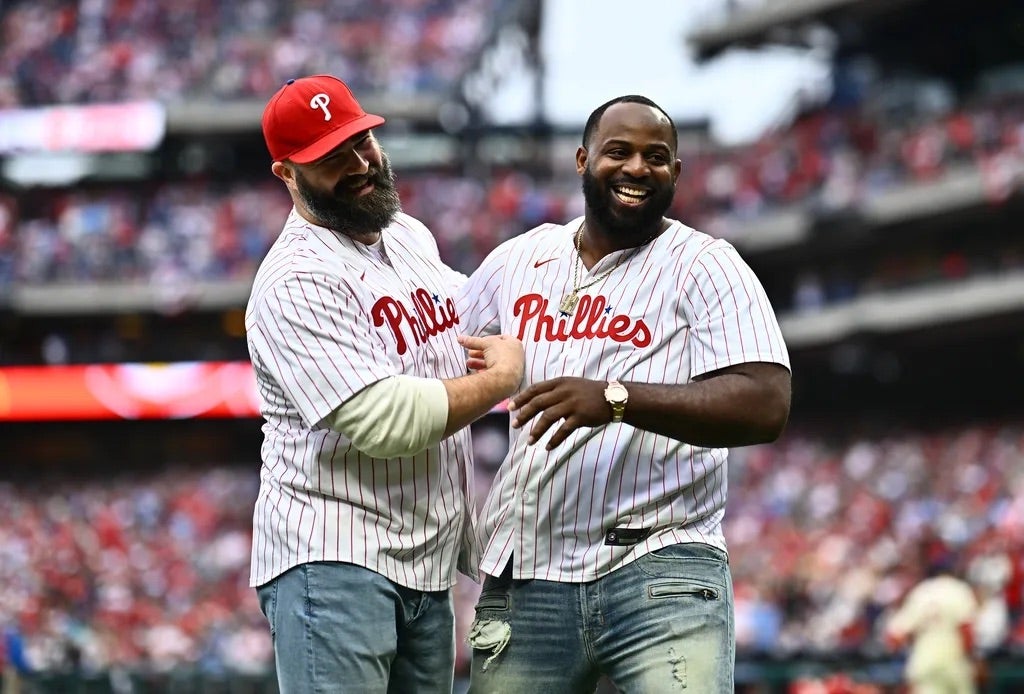 Former Philadelphia Eagles Jason Kelce and Fletcher Cox react after throwing the first pitch before the game between the Philadelphia Phillies and Atlanta Braves at Citizens Bank Park.