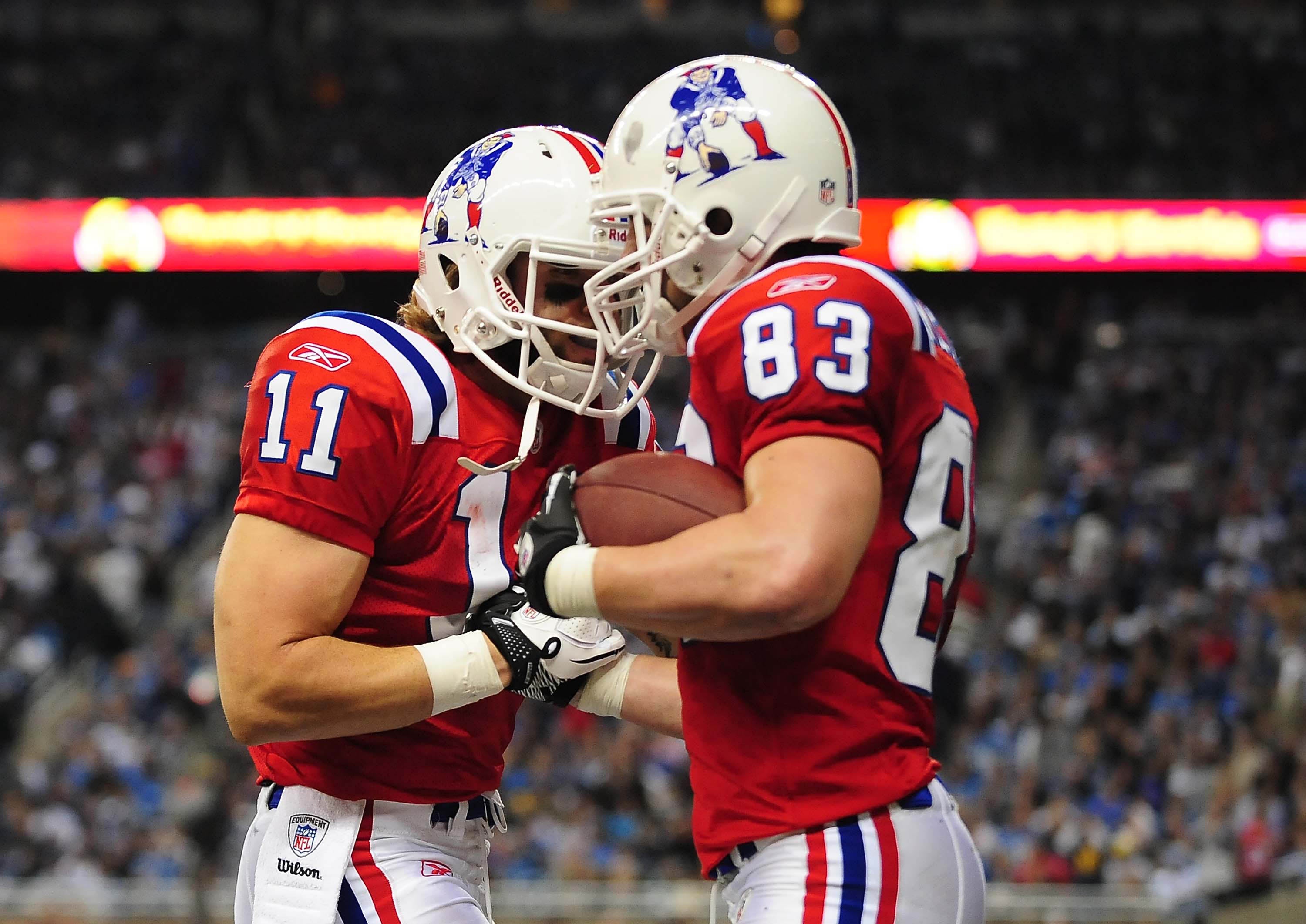 Nov. 25, 2010; Detroit, MI, USA; New England Patriots wide receiver Wes Welker (83) celebrates with teammate Julian Edelman (11) after scoring a touchdown during the fourth quarter against the Detroit Lions at Ford Field.