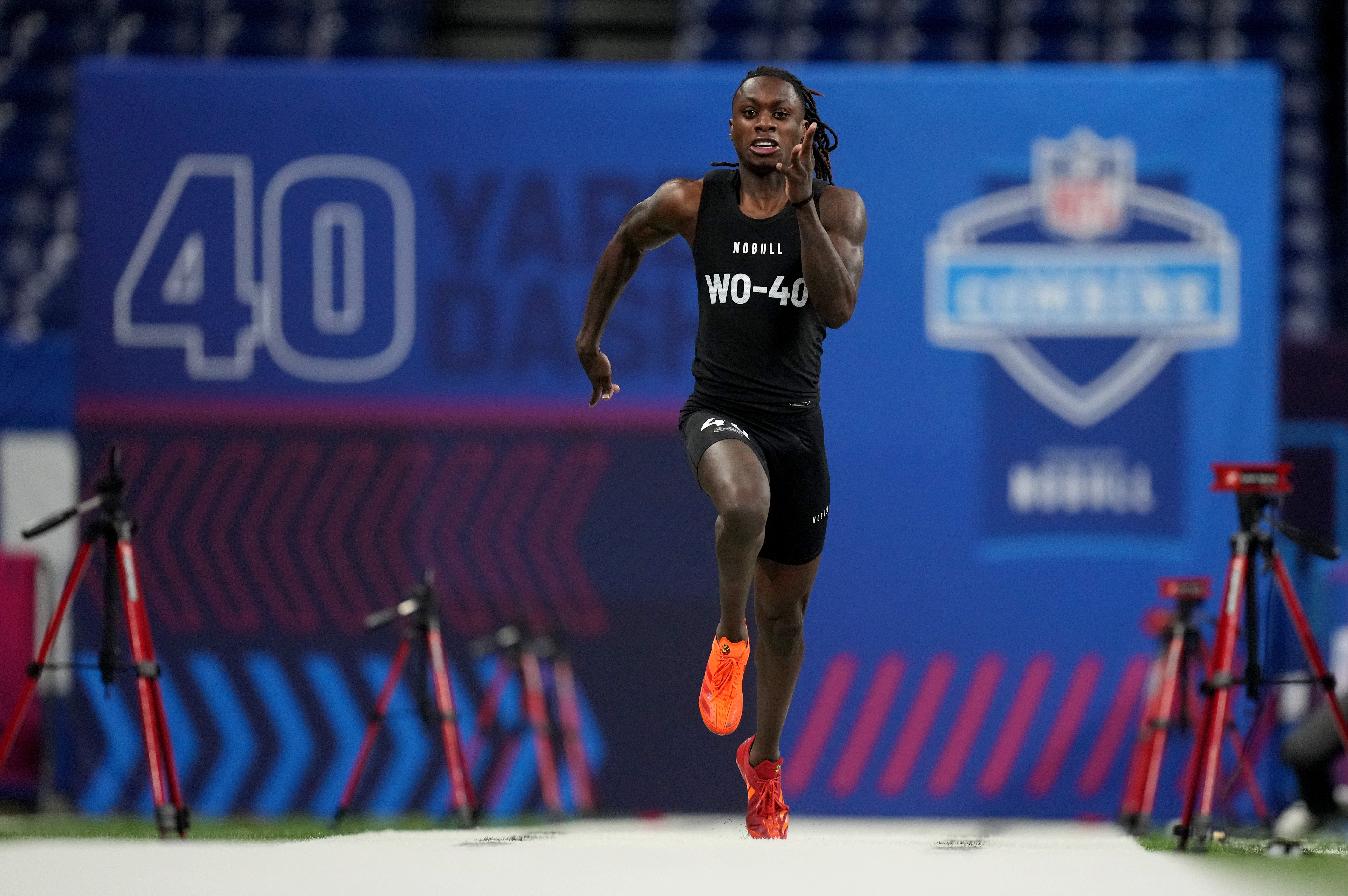 Mar 2, 2024; Indianapolis, IN, USA; Texas wide receiver Xavier Worthy (WO40) ran an official time of 4.21 seconds to set a combine record during the 2024 NFL Combine at Lucas Oil Stadium.