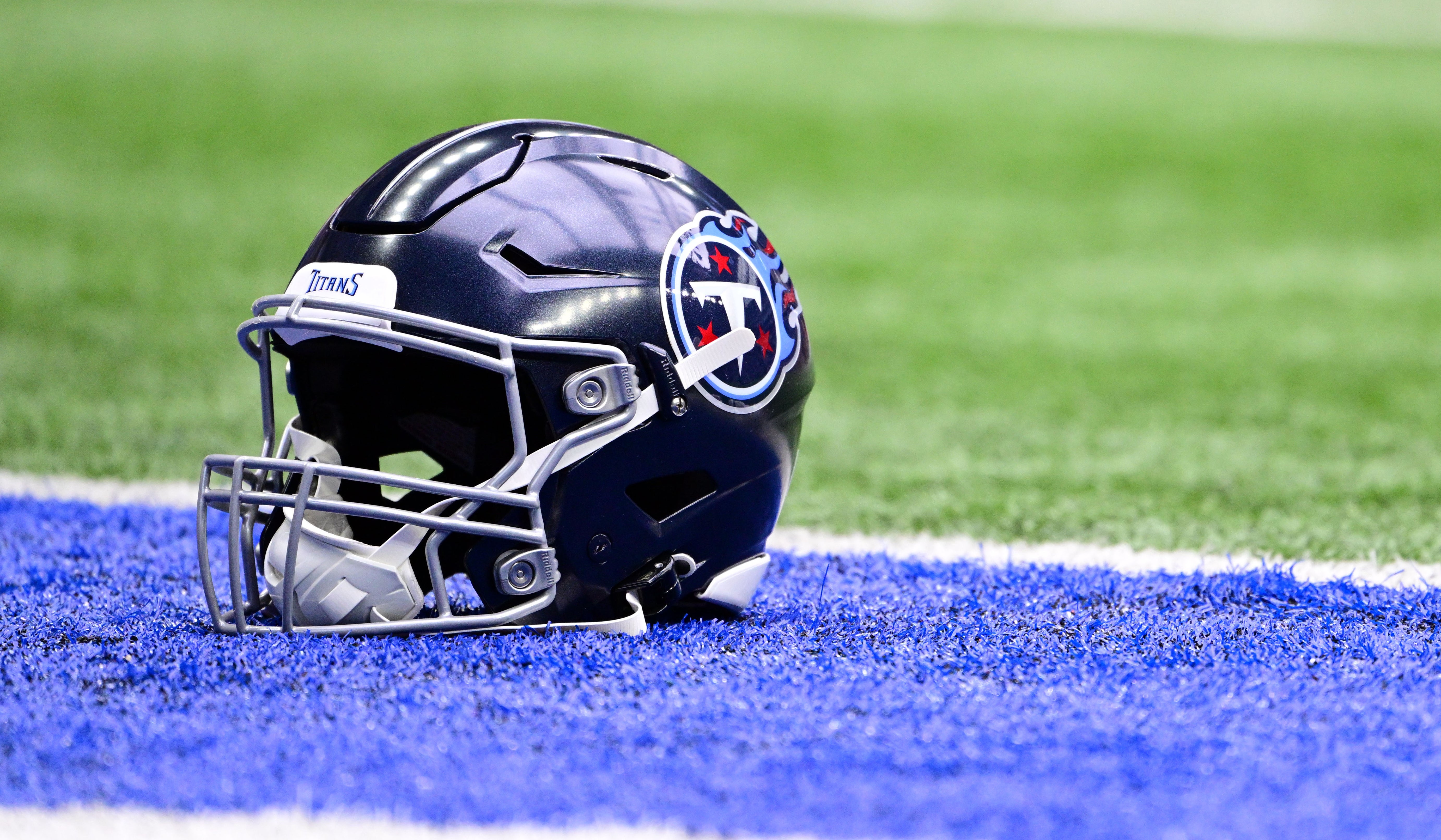 A Tennessee Titans helmet sits in the end zone before the game against the Indianapolis Colts at Lucas Oil Stadium. Marc Lebryk-USA TODAY Sports