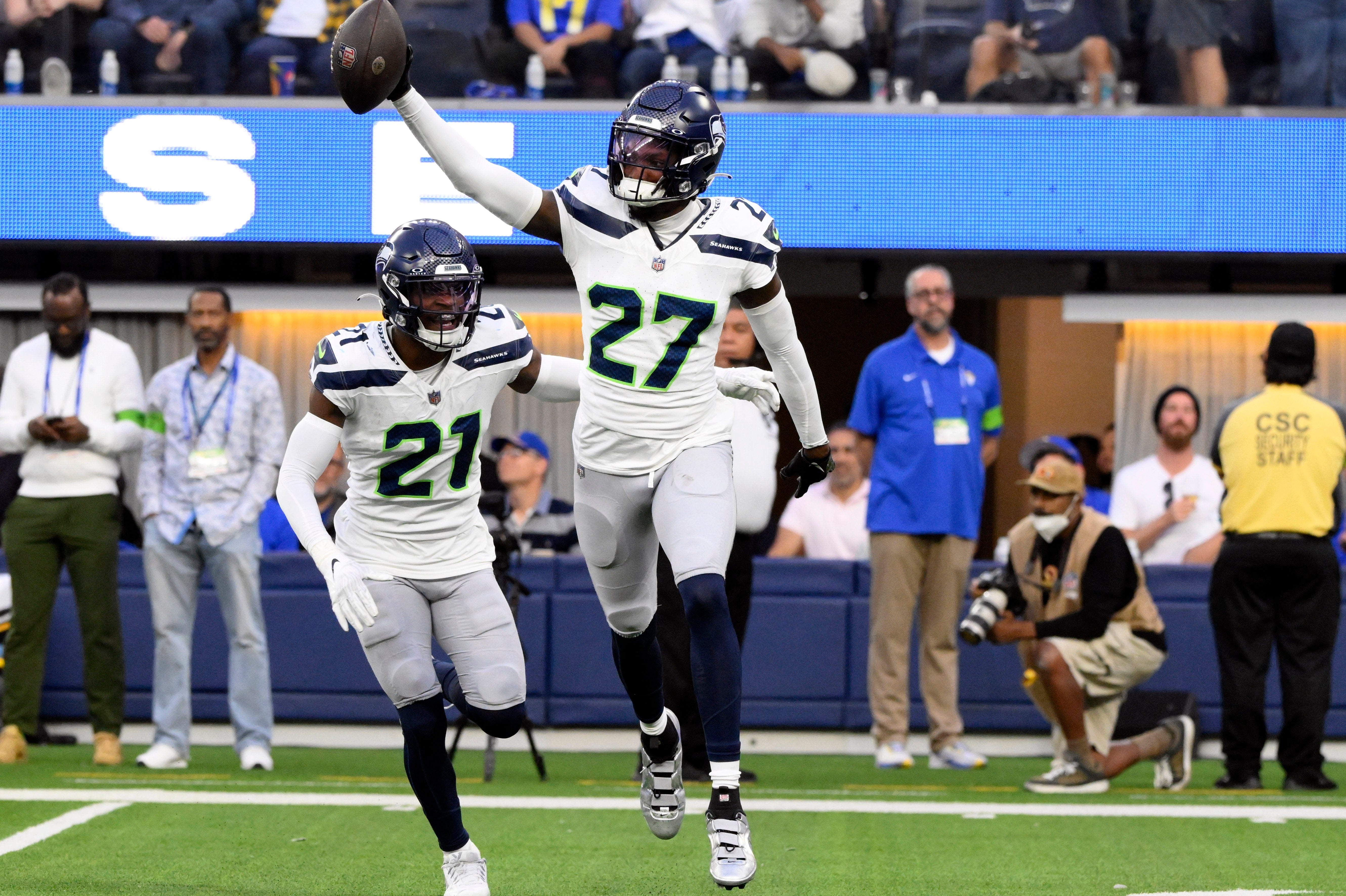 Nov 19, 2023; Inglewood, California, USA; Seattle Seahawks cornerback Riq Woolen (27) celebrates making an interception against the Los Angeles Rams in the fourth quarter at SoFi Stadium.