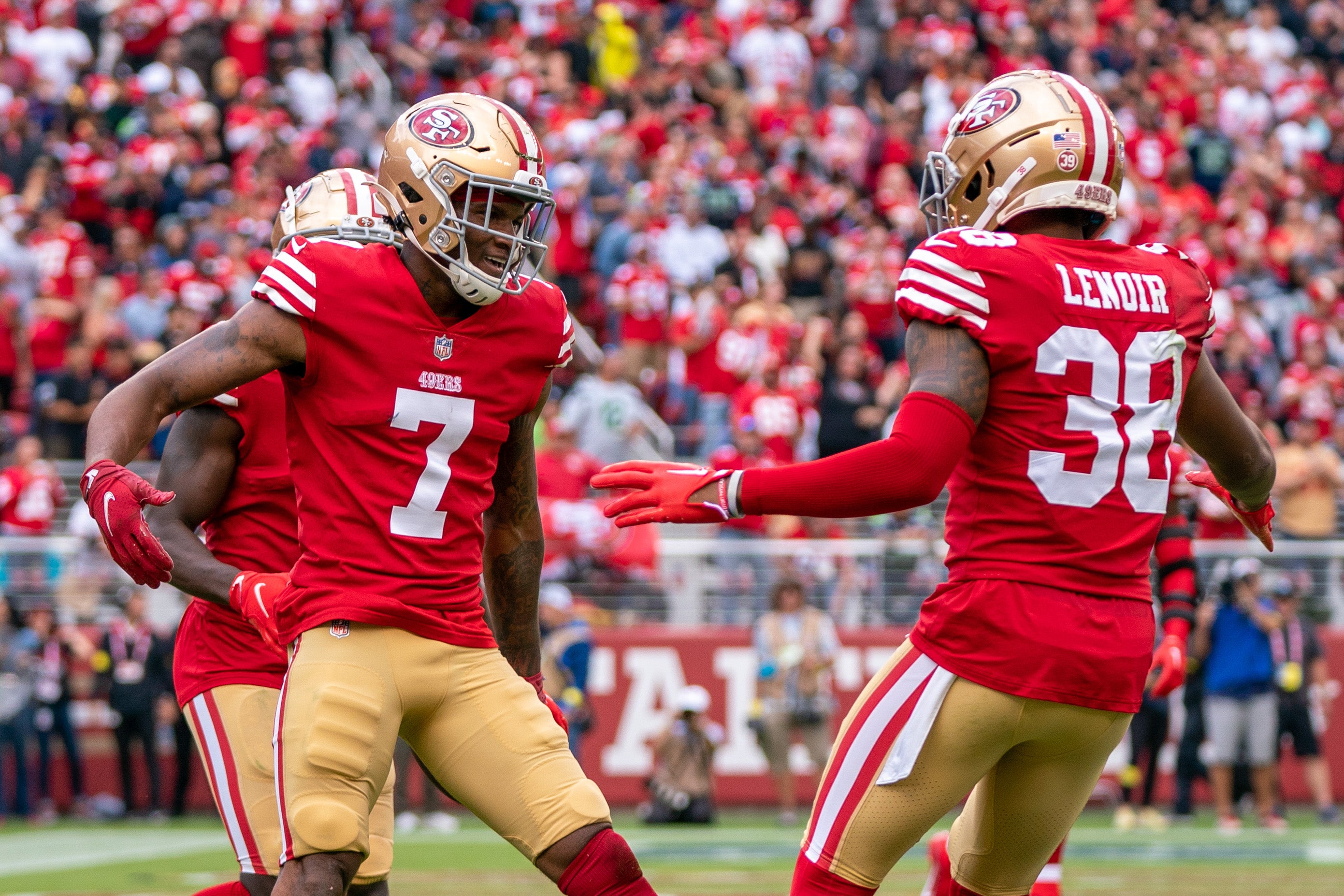 September 18, 2022; Santa Clara, California, USA; San Francisco 49ers cornerback Charvarius Ward (7) is congratulated by cornerback Deommodore Lenoir (38) during the second quarter against the Seattle Seahawks at Levi's Stadium.