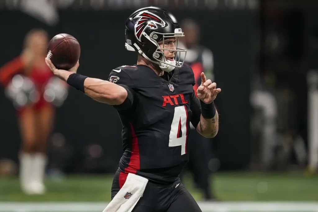 Atlanta Falcons quarterback Taylor Heinicke (4) passes against the Indianapolis Colts at Mercedes-Benz Stadium.