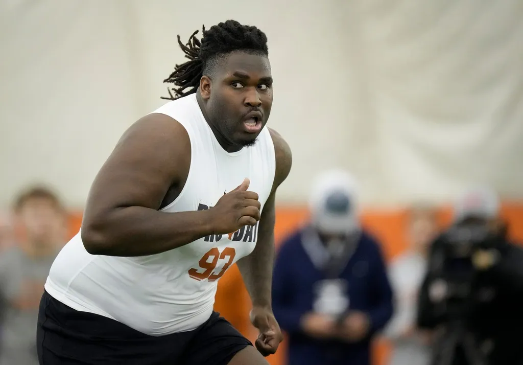 Defensive lineman TVondre Sweat runs through drills at Texas Longhorns Football Pro Day at Frank Denius Fields Wednesday March 20, 2024