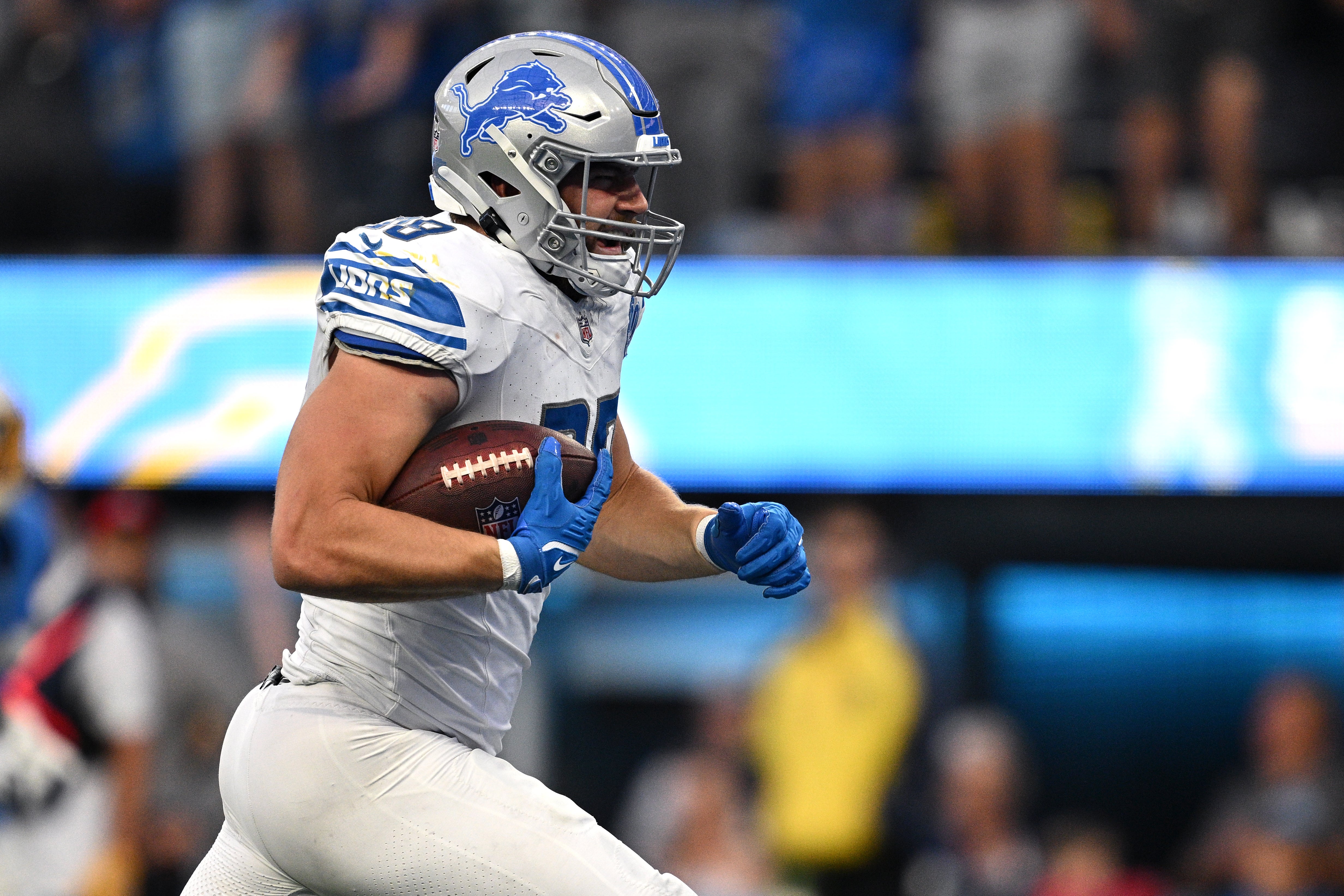 Nov 12, 2023; Inglewood, California, USA; Detroit Lions tight end Brock Wright (89) reacts after scoring a touchdown against the Los Angeles Chargers during the second half at SoFi Stadium.