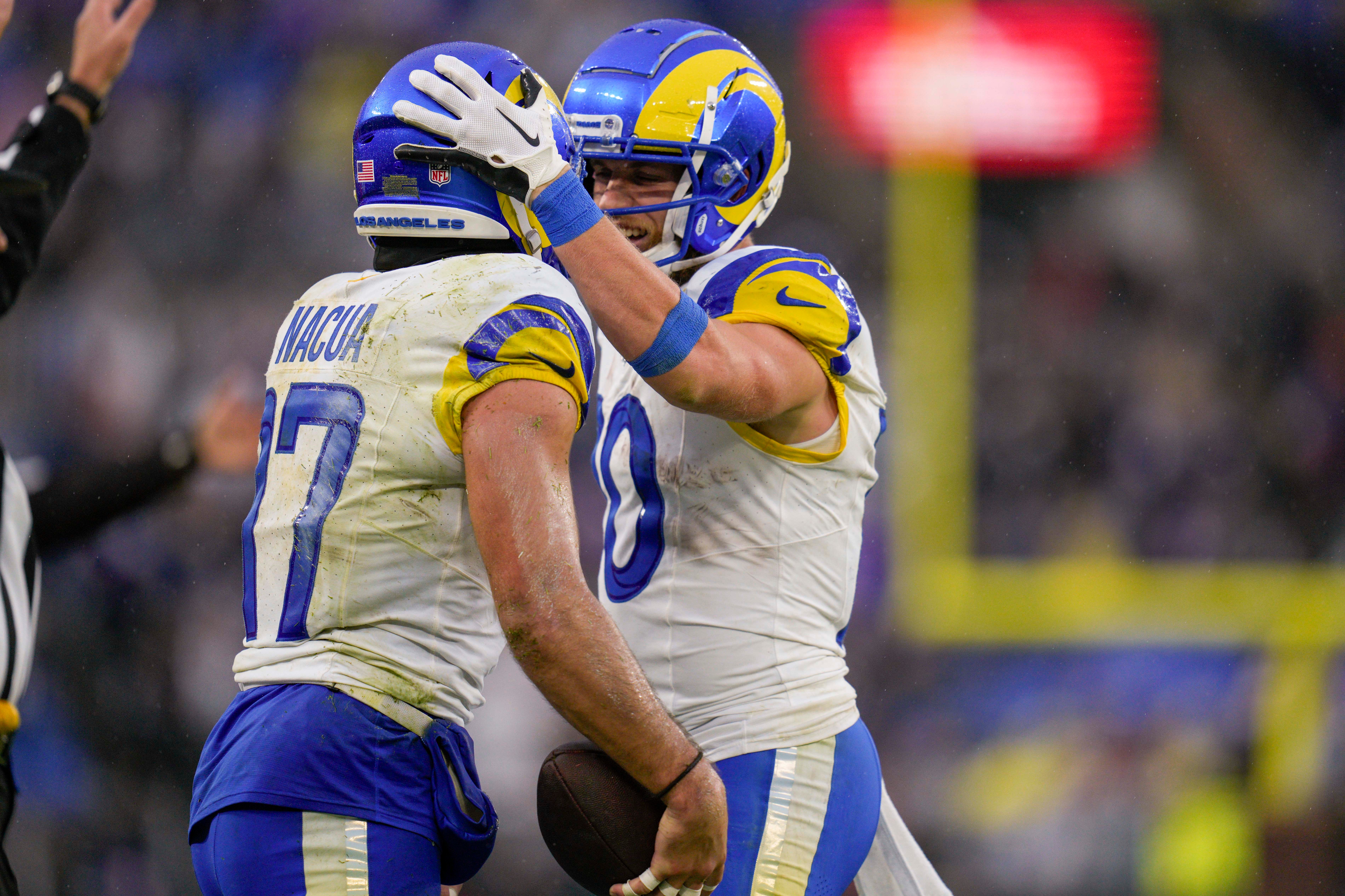 Dec 10, 2023; Baltimore, Maryland, USA; Los Angeles Rams wide receiver Puka Nacua (17) celebrates his catch against the Baltimore Ravens with wide receiver Cooper Kupp (10) during the fourth quarter at M&T Bank Stadium. Mandatory Credit: Jessica Rapfogel-USA TODAY Sports
