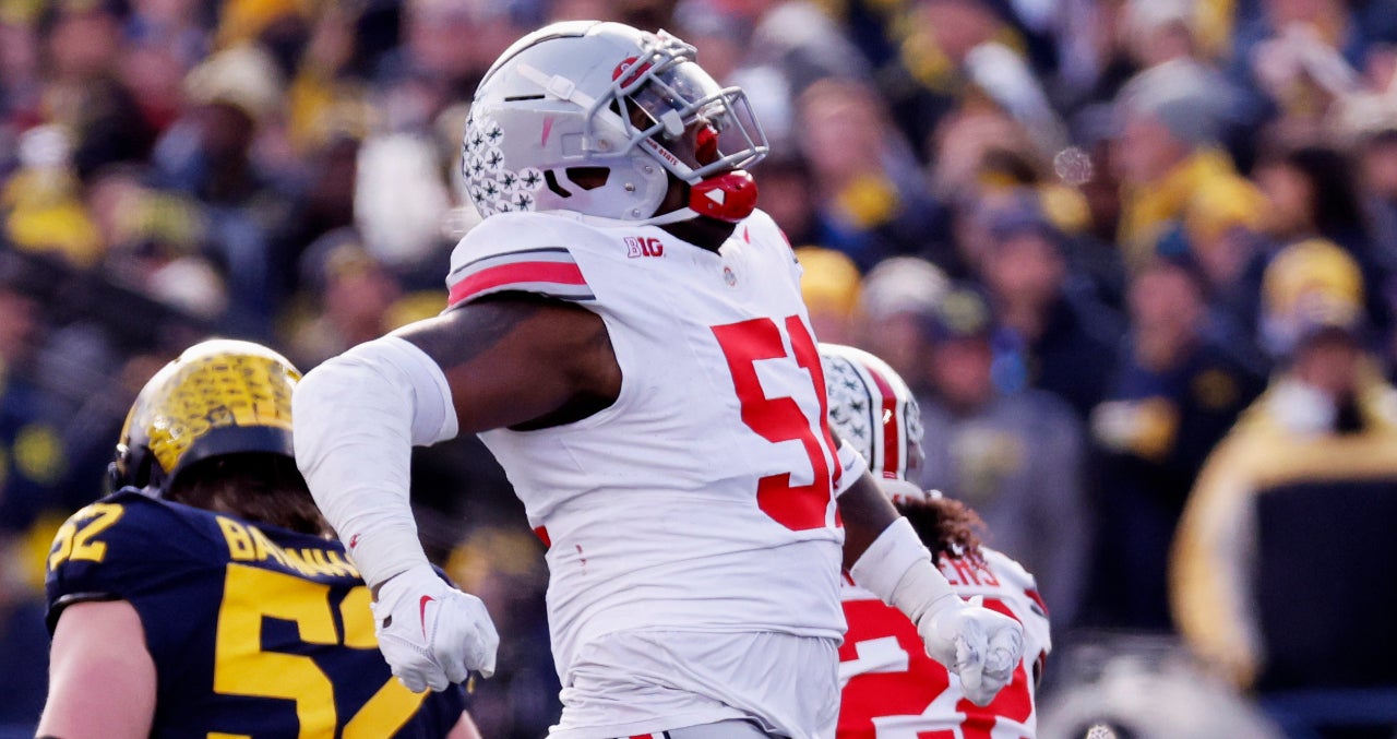 Nov 25, 2023; Ann Arbor, Michigan, USA; Ohio State Buckeyes defensive tackle Michael Hall Jr. (51) celebrates in the first half against the Michigan Wolverines at Michigan Stadium.