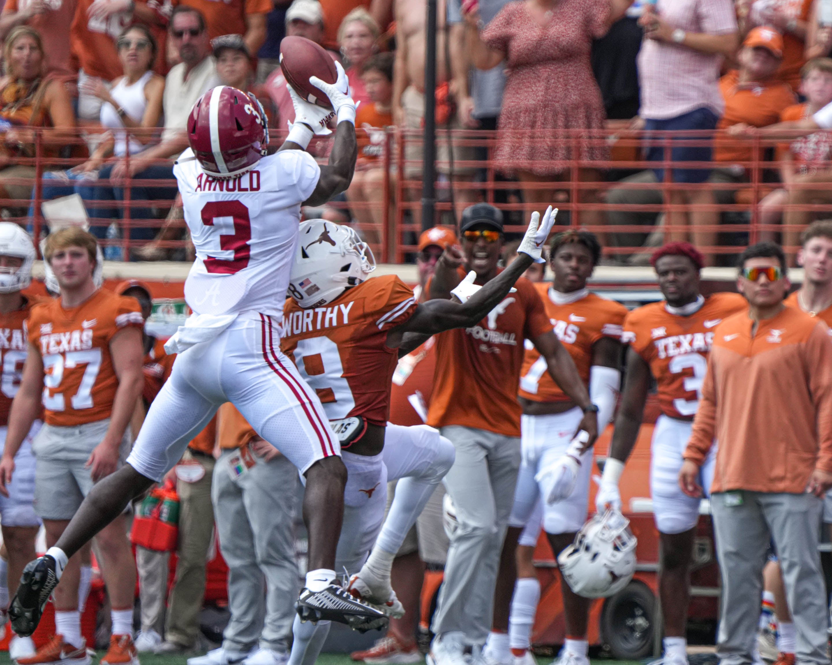 Sep 10, 2022; Austin, TX, USA; Alabama defensive back Terrion Arnold (3) jumps to intercept a pass over Texas wide receiver Xavier Worthy (8) during the game at Royal Memorial Stadium on Sep. 10, 2022. Mandatory Credit: Aaron E. Martinez/Austin American-Statesman-USA TODAY NETWORK