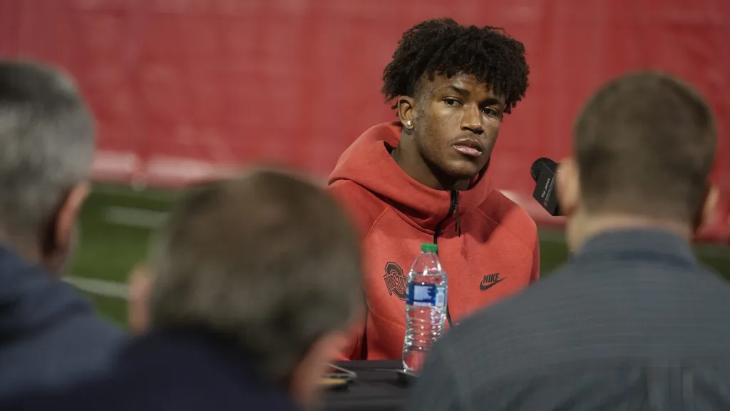 Ohio State University football safety Caleb Downs talks with the media during his first sit-down interview since transferring from Alabama. He was the national freshman of the year at Alabama