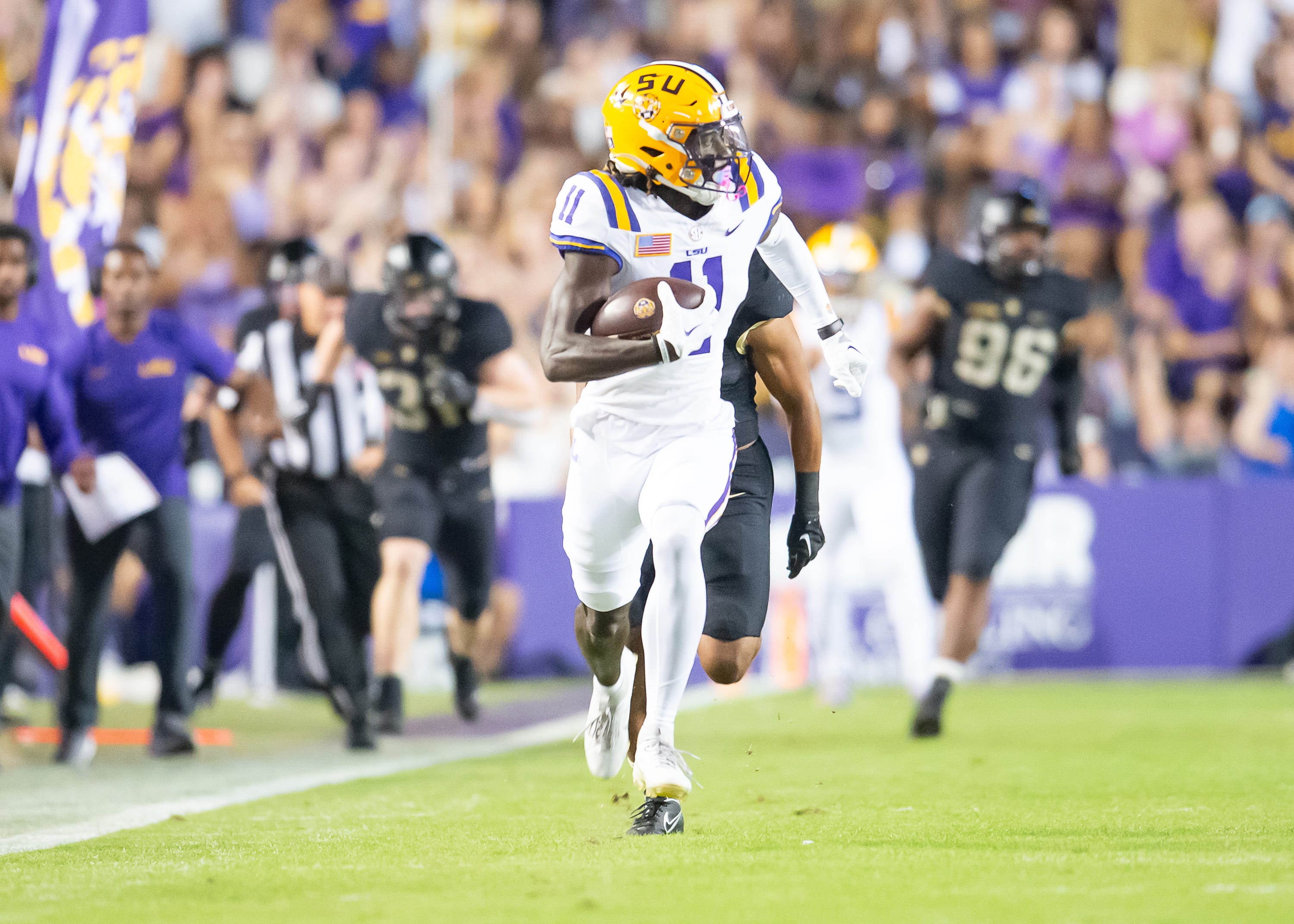 Brian Thomas Jr (11) pick six and scores a touchdown as the LSU Tigers take on the the Army Black Knights in Tiger Stadium in Baton Rouge, Louisiana, October. 21, 2023.