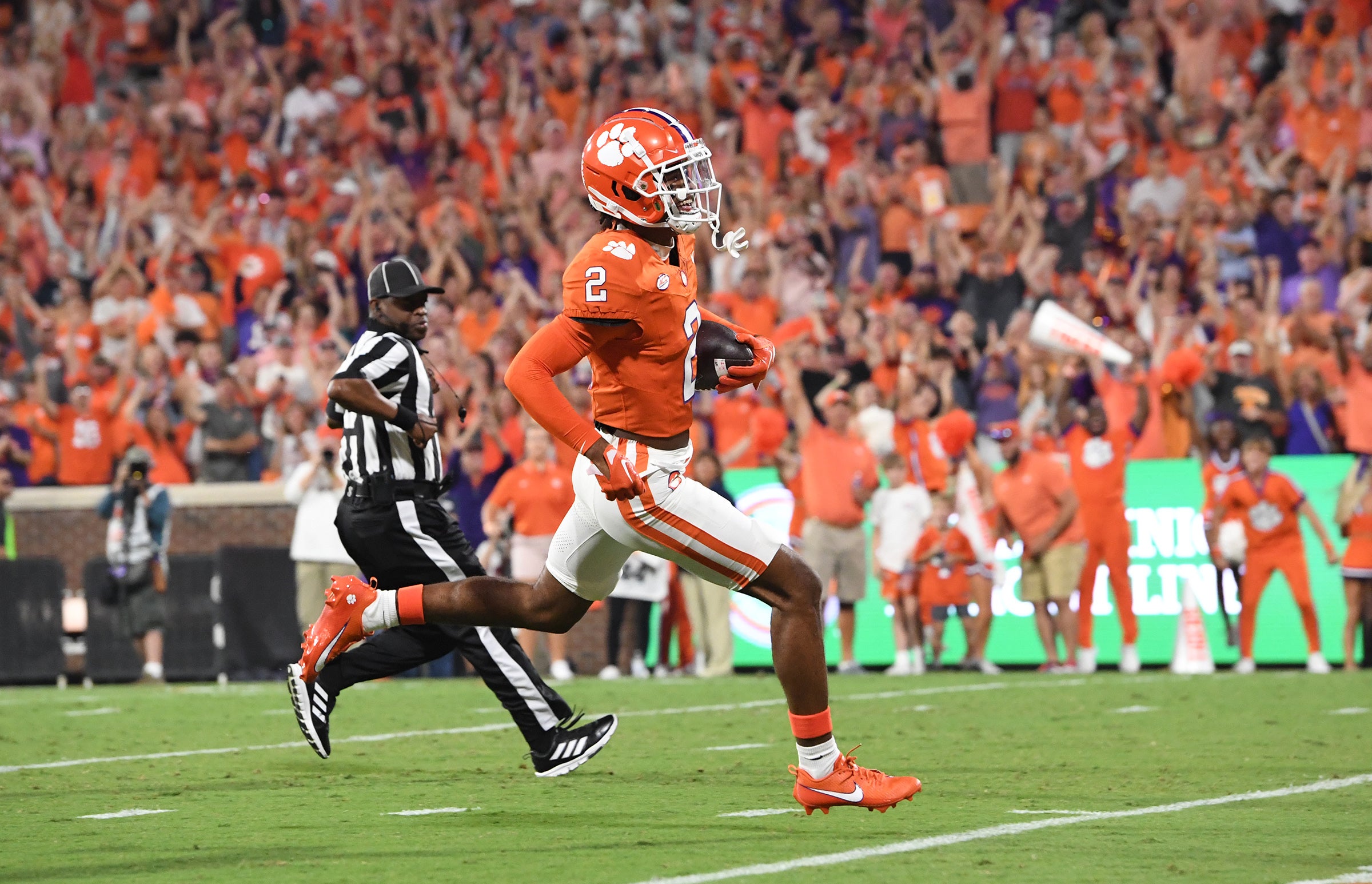 Sep 16, 2023; Clemson, South Carolina; Clemson cornerback Nate Wiggins (2) returns an interception for a touchdown during the first quarter against Florida Atlantic at Memorial Stadium.