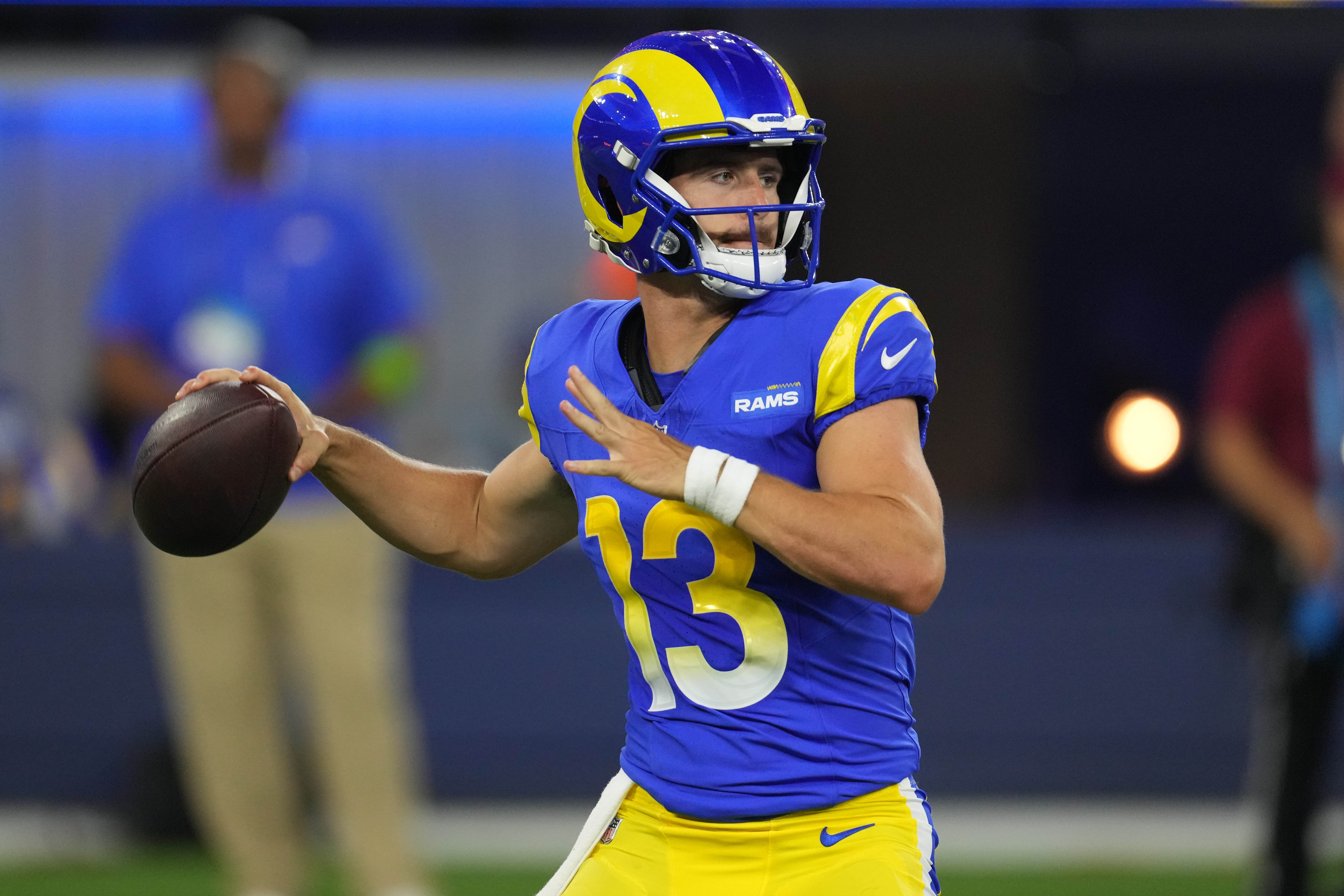 Aug 12, 2023; Inglewood, California, USA; Los Angeles Rams quarterback Stetson Bennett (13) throws the ball in the second half against the Los Angeles Chargers at SoFi Stadium.