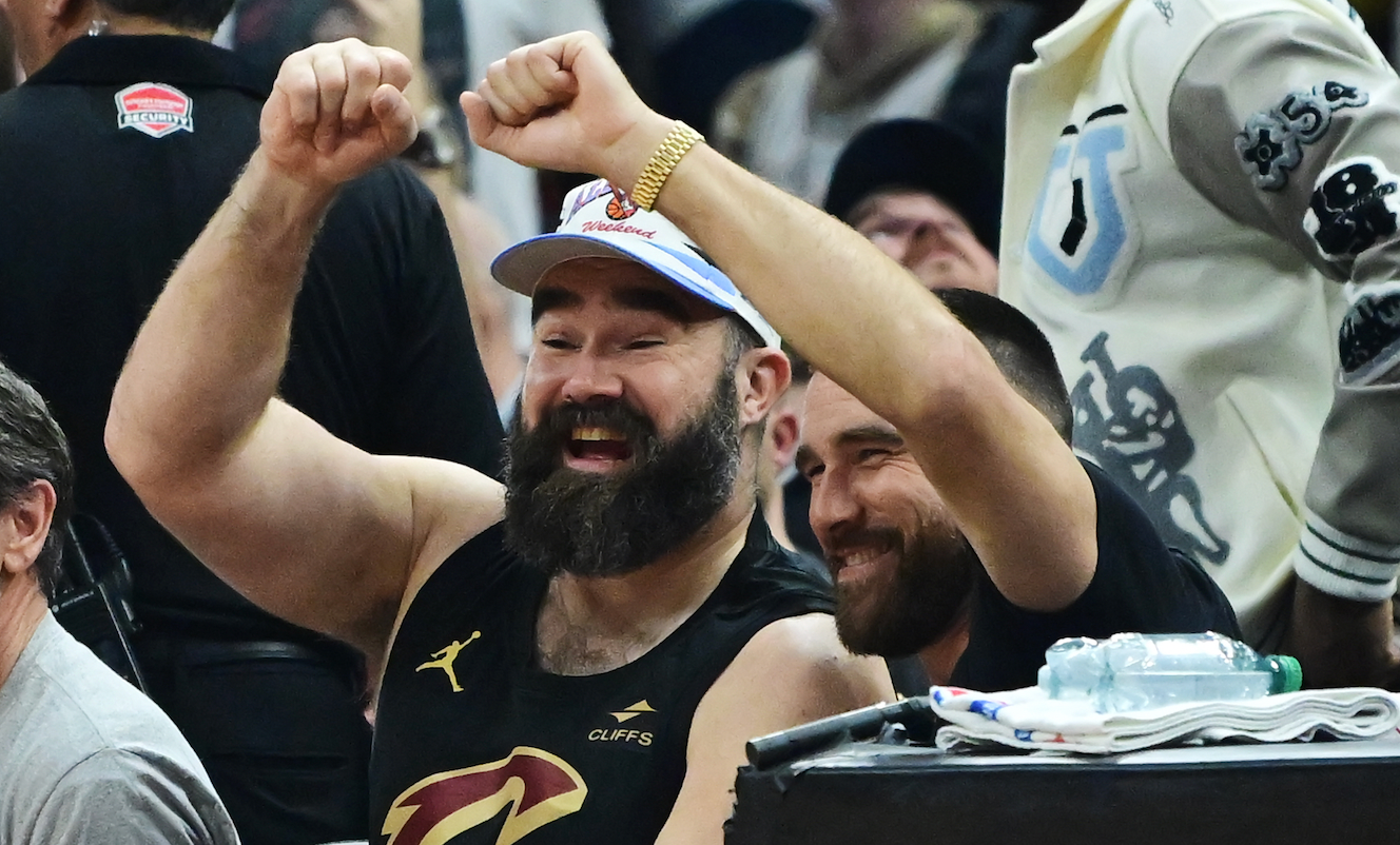 Mar 5, 2024; Cleveland, Ohio, USA; Jason, middle, and Travis Kelce, right, watch the game between the Cleveland Cavaliers and the Boston Celtics during the first half at Rocket Mortgage FieldHouse.