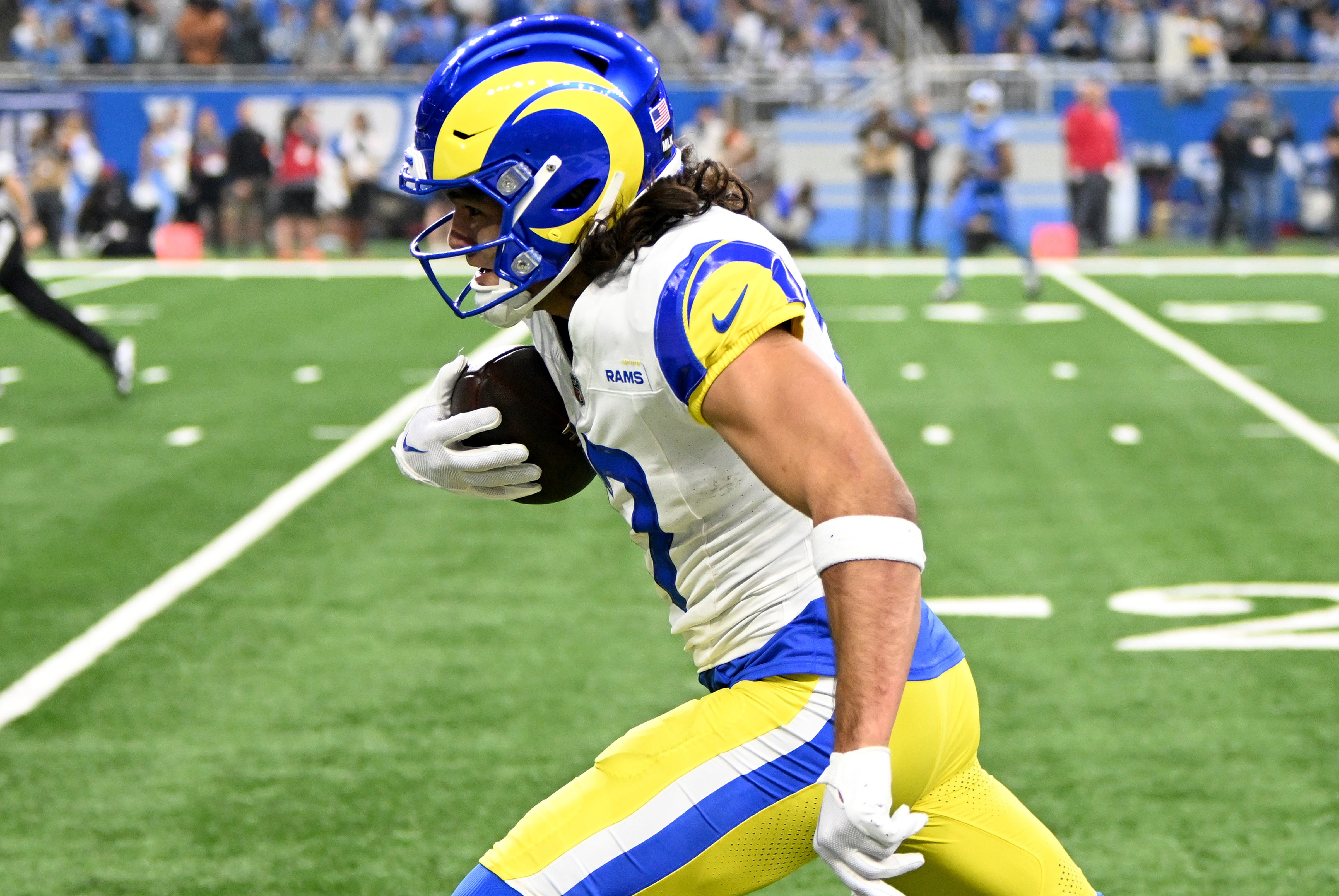 Jan 14, 2024; Detroit, Michigan, USA; Los Angeles Rams wide receiver Puka Nacua (17) scores a touchdown during the first half of a 2024 NFC wild card game against the Detroit Lions at Ford Field. Mandatory Credit: Lon Horwedel-USA TODAY Sports