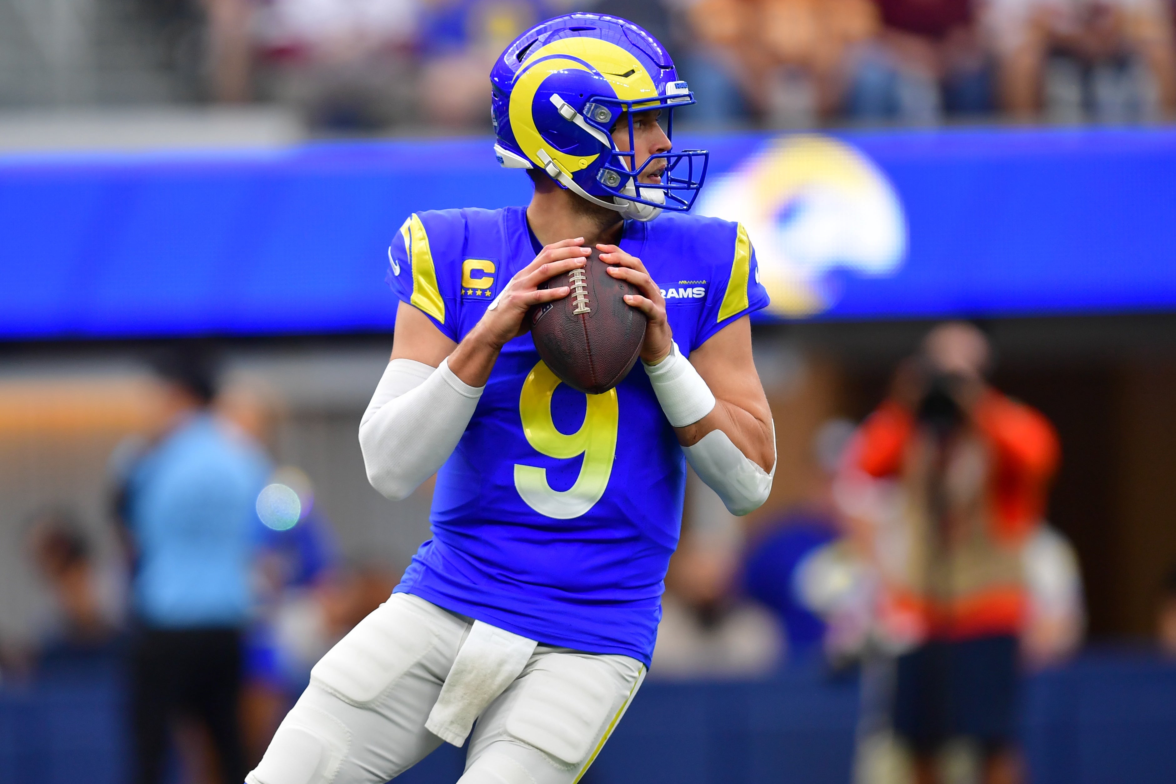 Dec 17, 2023; Inglewood, California, USA; Los Angeles Rams quarterback Matthew Stafford (9) drops back to pass against the against the Washington Commanders during the first half at SoFi Stadium.
