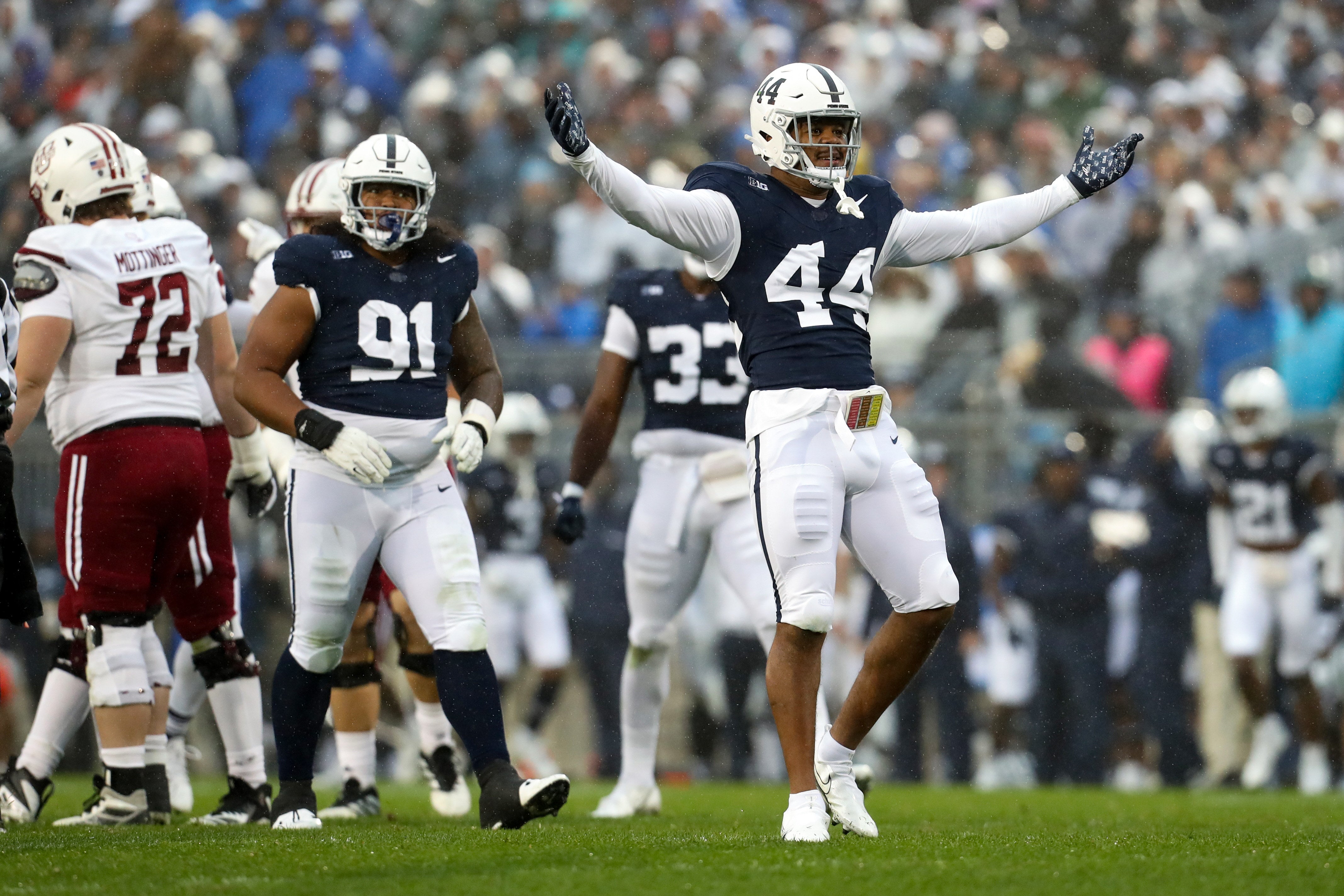 Oct 14, 2023; University Park, Pennsylvania, USA; Penn State Nittany Lions defensive end Chop Robinson (44) celebrates following a sack on Massachusetts Minutemen quarterback Taisun Phommachanh (3) during the second quarter at Beaver Stadium. Penn State defeated Massachusetts 63-0. Mandatory Credit: Matthew O'Haren-USA TODAY Sports