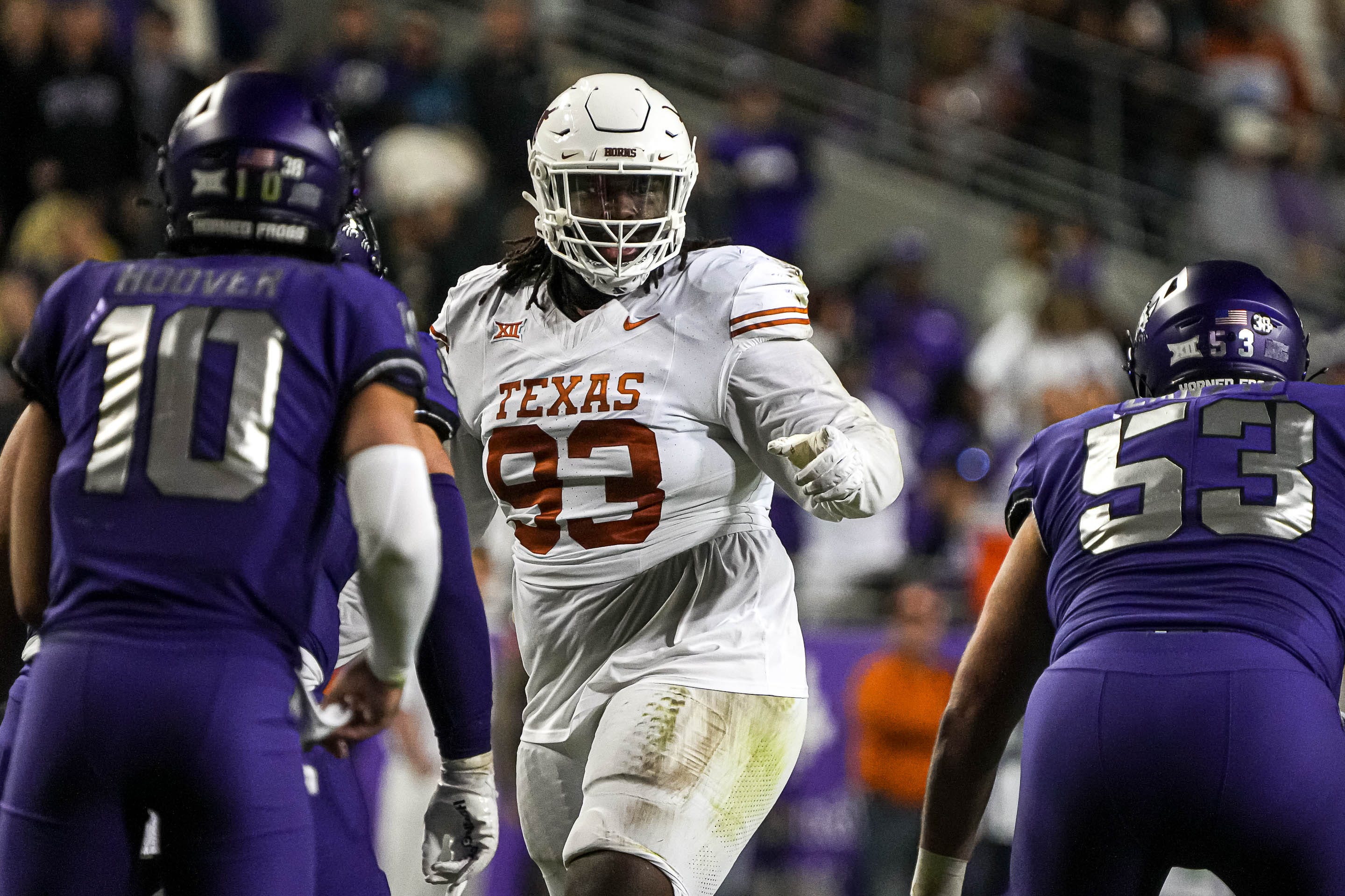 Texas Longhorns defensive lineman T'Vondre Sweat (93) directs the defense during the game against Texas Christian University at Amon G. Carter Stadium on Saturday, Nov. 11, 2023 in Fort Worth, Texas.