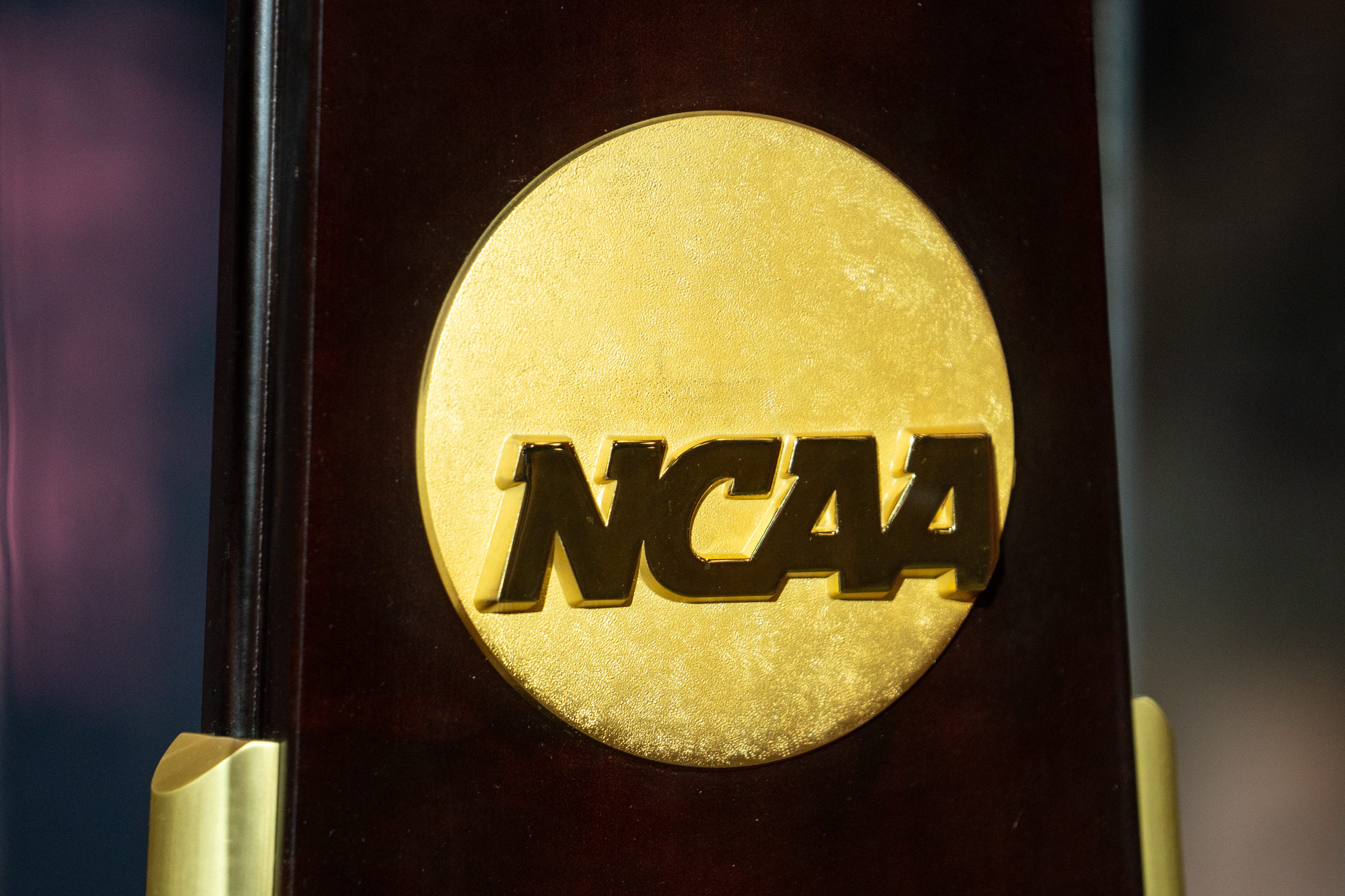 NCAA Division I men's basketball championship trophy is displayed during the Men's Final Four Fan Fest at the Phoenix Convention Center in Phoenix on April 6, 2024.