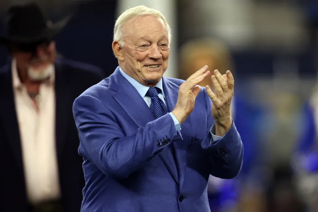 Dallas Cowboys owner Jerry Jones applauds during the Ring of Honor induction ceremony at half time in the game against the Detroit Lions at AT&T Stadium.