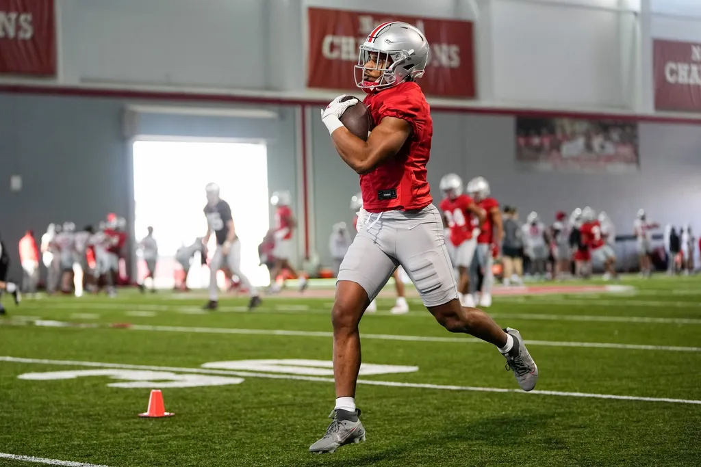 Ohio State Buckeyes running back Dallan Hayden (5) catches a pass during the first spring practice at the Woody Hayes Athletic Center