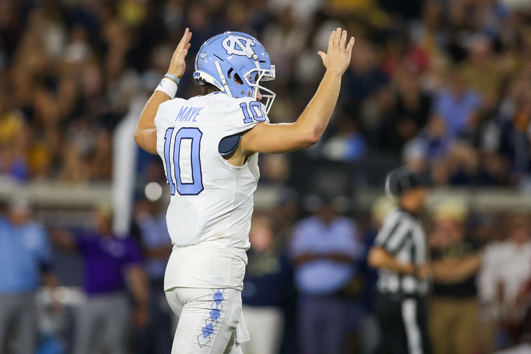 Oct 28, 2023; Atlanta, Georgia, USA; North Carolina Tar Heels quarterback Drake Maye (10) reacts after a touchdown against the Georgia Tech Yellow Jackets in the first half at Bobby Dodd Stadium at Hyundai Field.