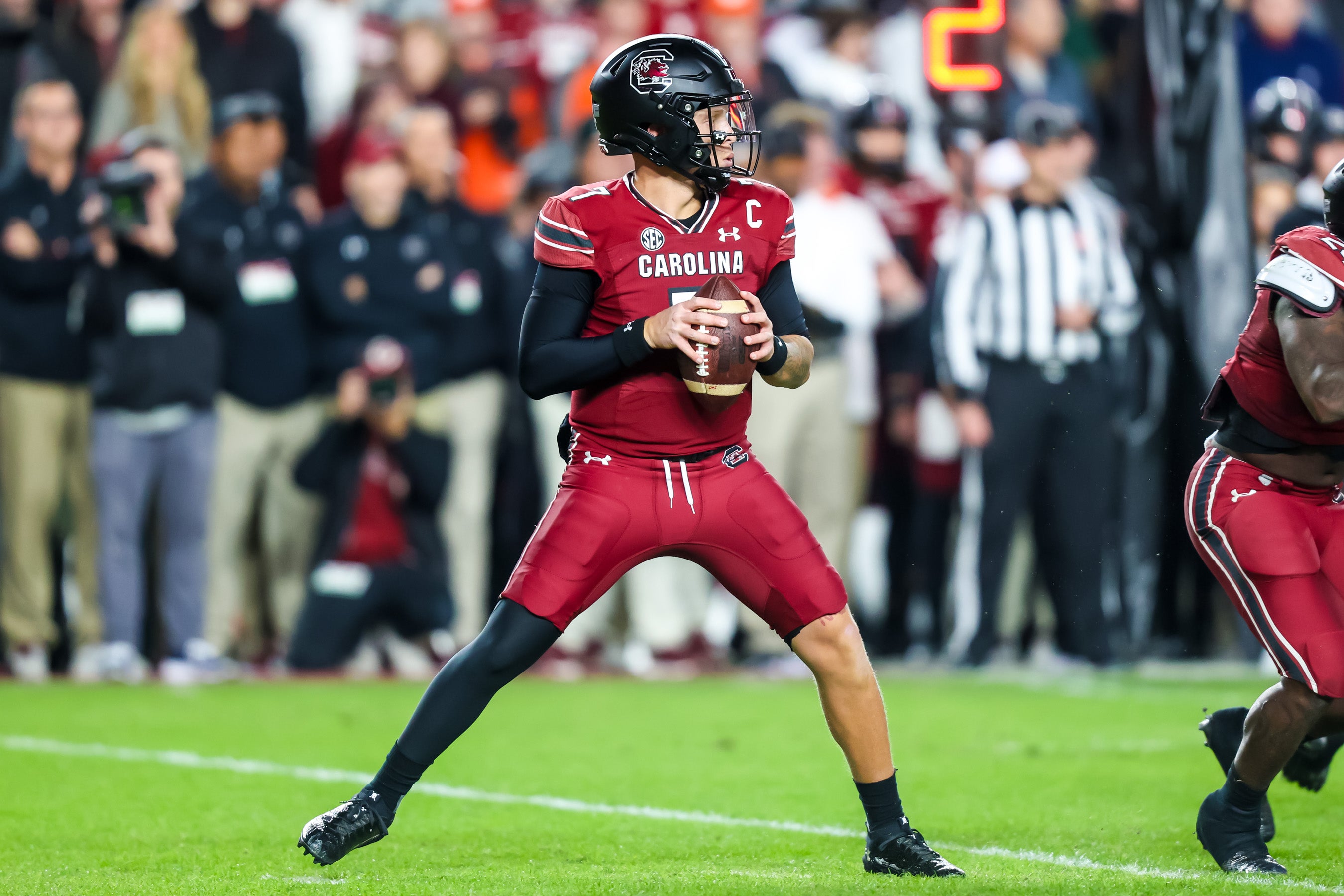 Nov 25, 2023; Columbia, South Carolina, USA; South Carolina Gamecocks quarterback Spencer Rattler (7) drops back to pass against the Clemson Tigers in the first quarter at Williams-Brice Stadium.