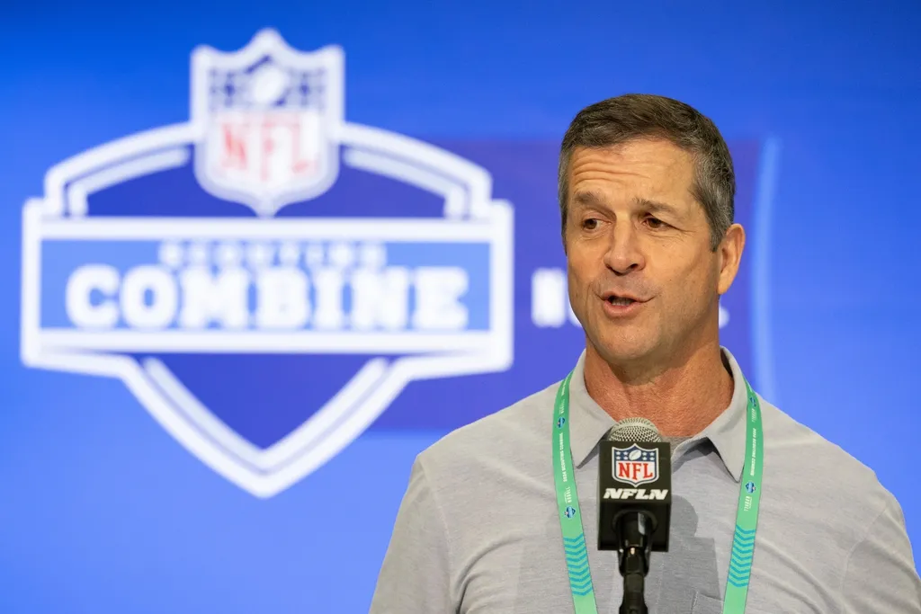Baltimore Ravens head coach John Harbaugh talks to the media at the 2024 NFL Combine at Indiana Convention Center.