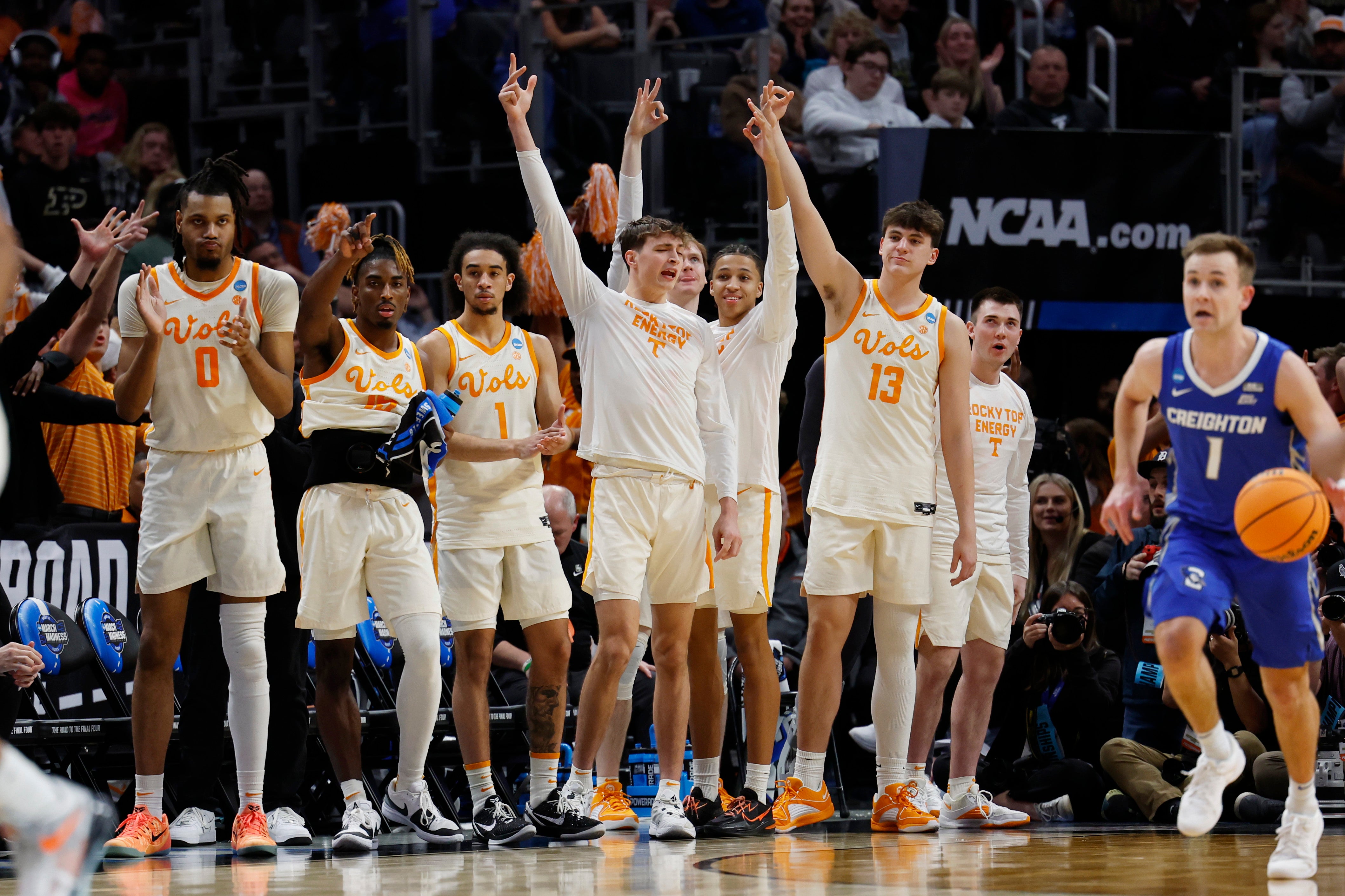 Mar 29, 2024; Detroit, MN, USA; Tennessee Volunteers bench celebrate in the second half against the Creighton Bluejays during the NCAA Tournament Midwest Regional at Little Caesars Arena.