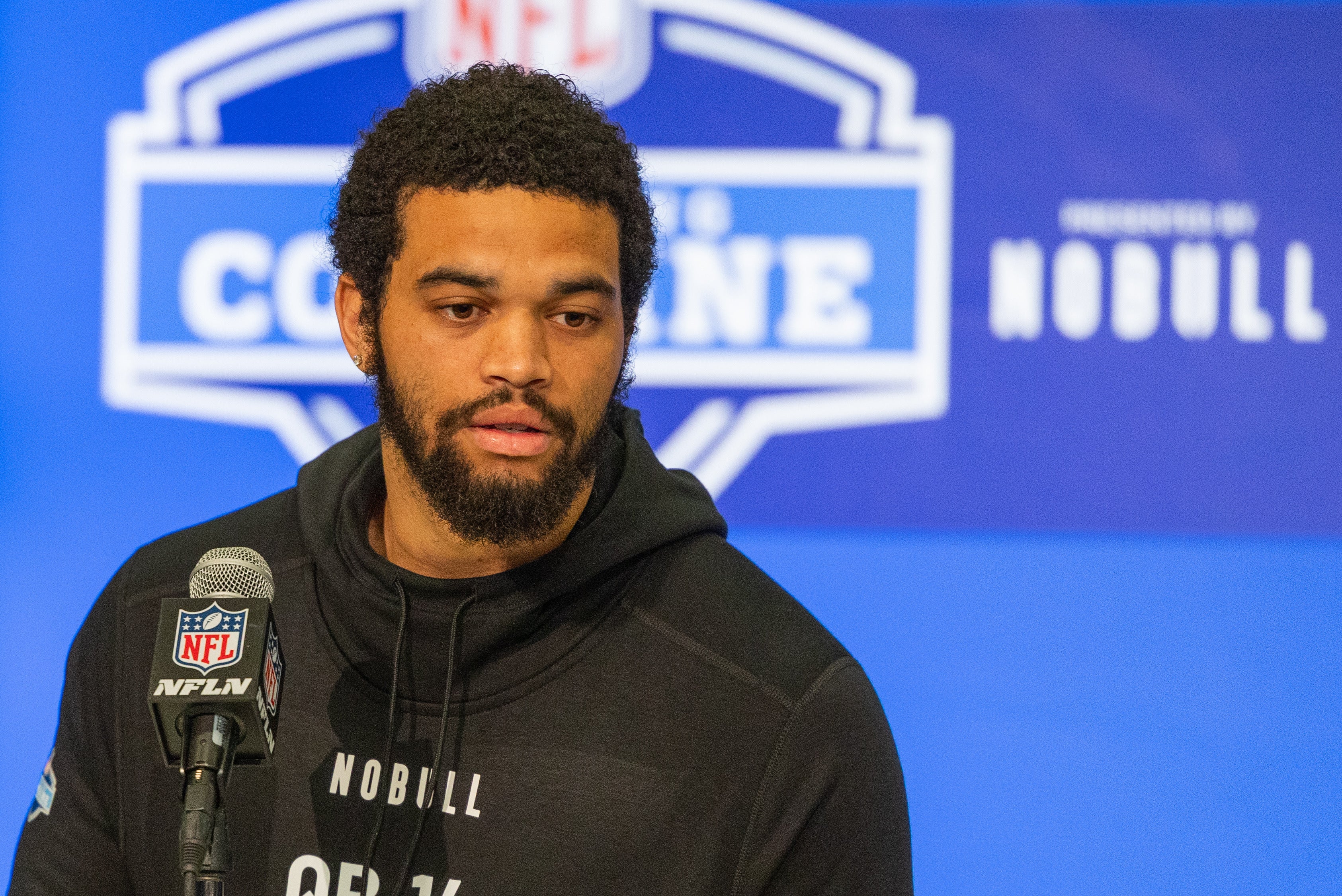 Mar 1, 2024; Indianapolis, IN, USA; Southern California quarterback Caleb Williams (QB14) talks to the media during the 2024 NFL Combine at Lucas Oil Stadium.