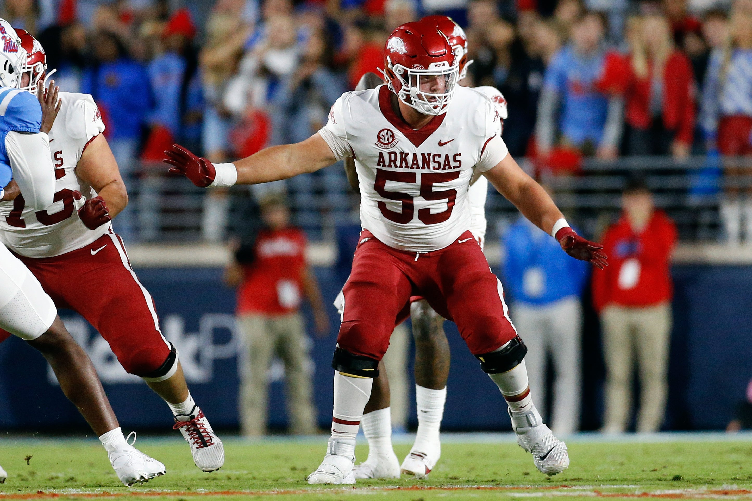 Oct 7, 2023; Oxford, Mississippi, USA; Arkansas Razorbacks offensive linemen Beaux Limmer (55) blocks during the second half against the Mississippi Rebels at Vaught-Hemingway Stadium.